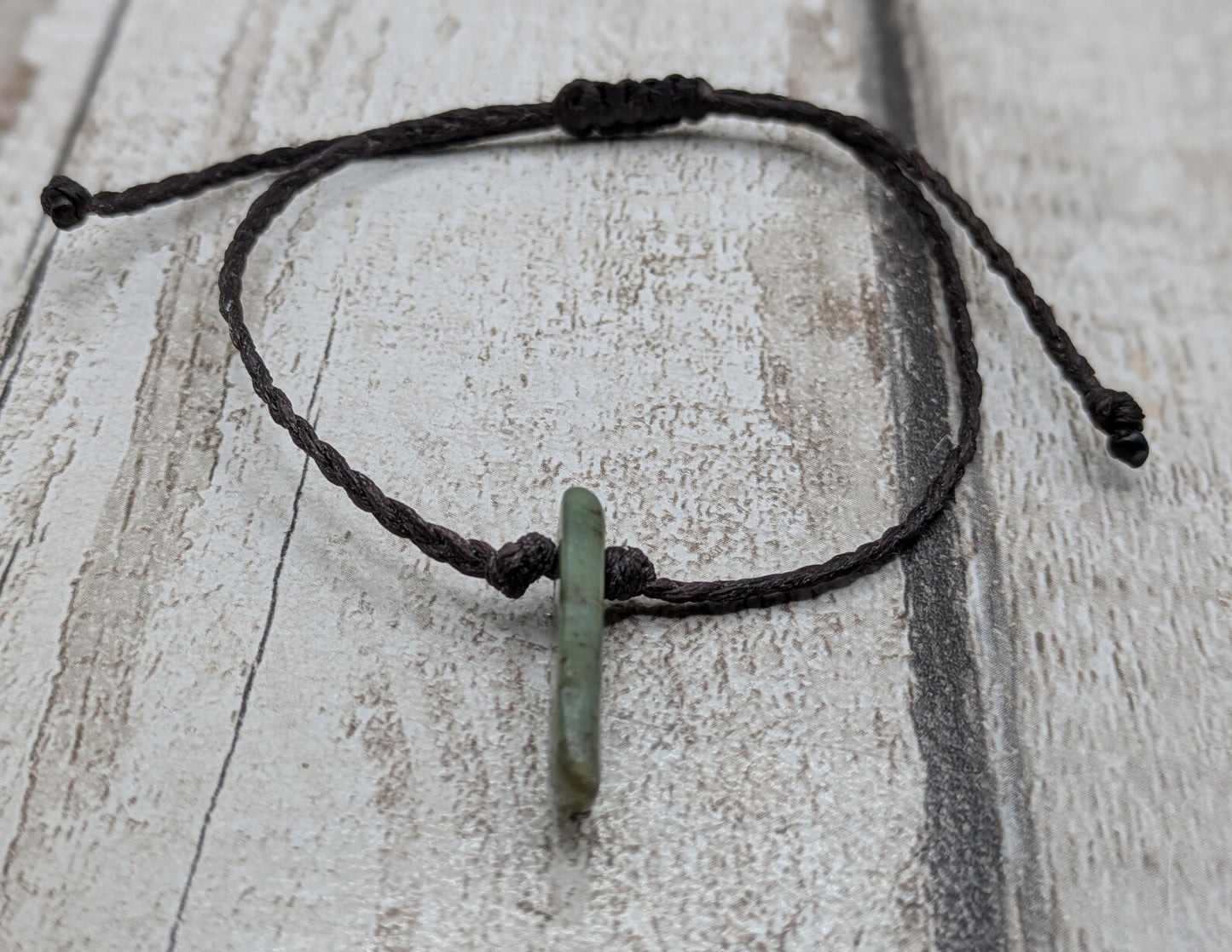 Tumble polished Pounamu greenstone jade adjustable bracelet.