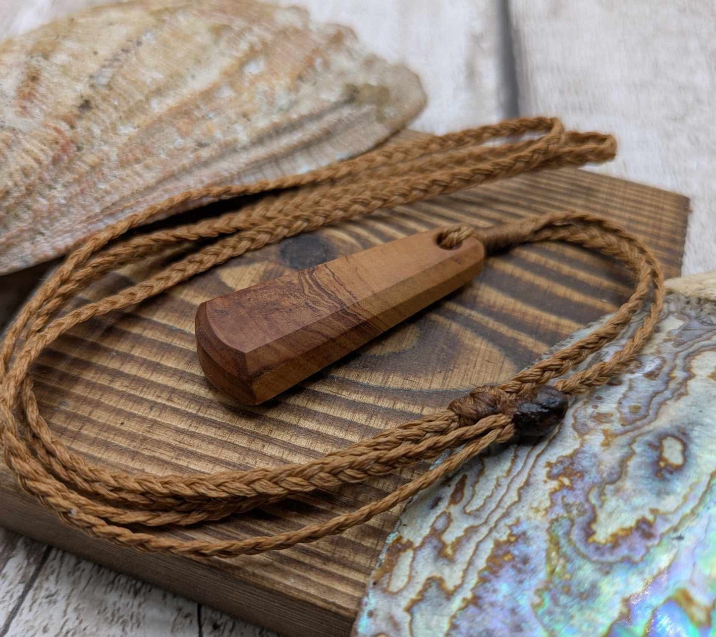 NZ Rimu wood roimata teardrop pendant.