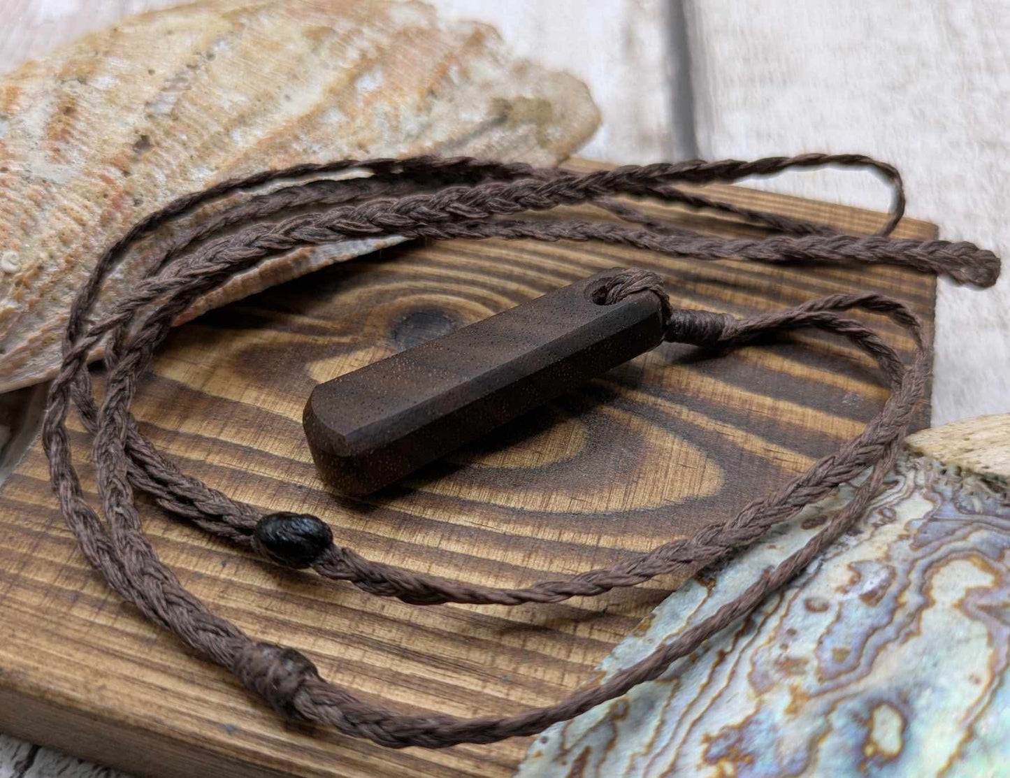 Walnut wood roimata tear drop pendant.