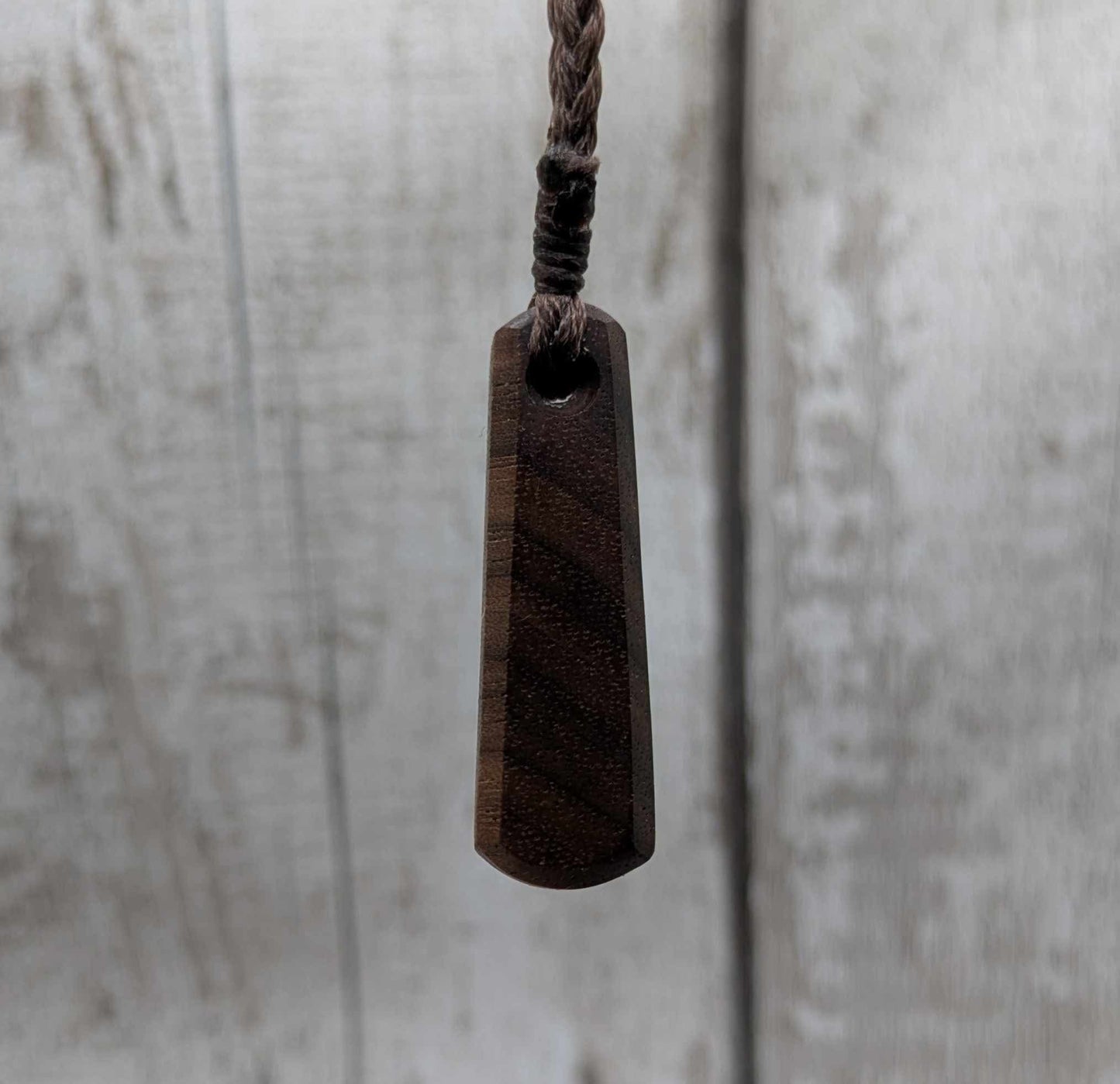 Walnut wood roimata tear drop pendant.