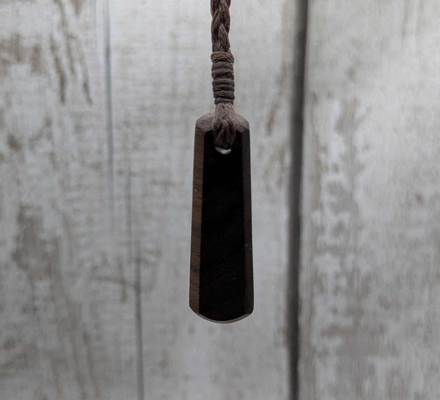 Walnut wood roimata tear drop pendant.