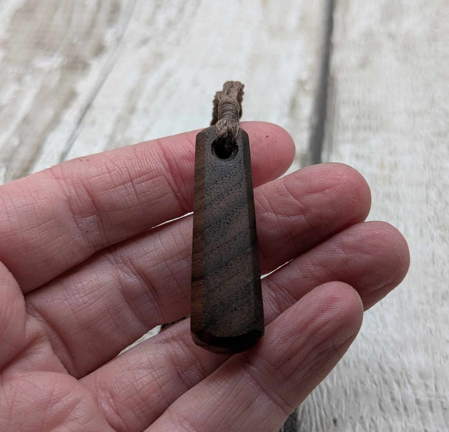 Walnut wood roimata tear drop pendant.