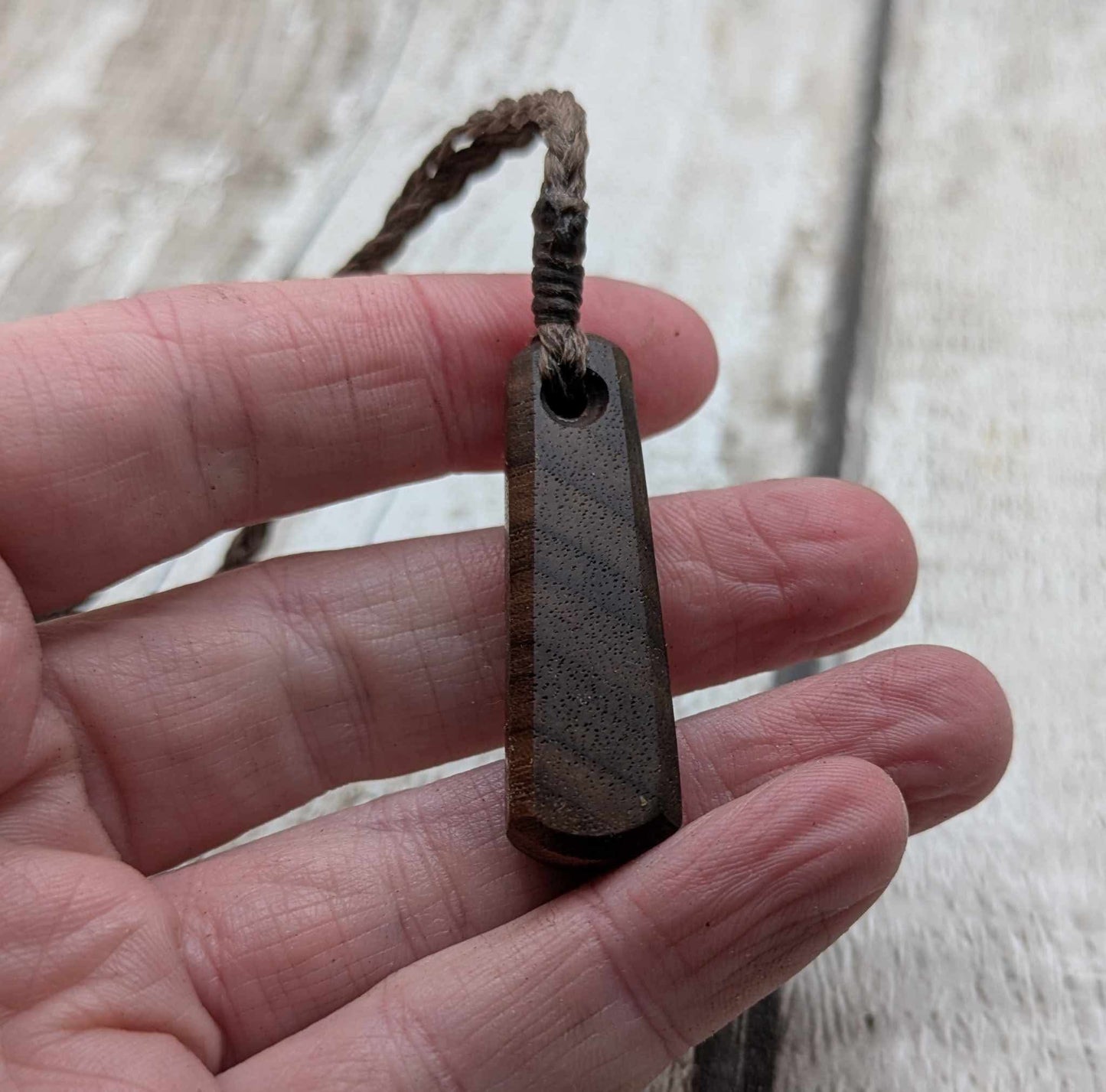 Walnut wood roimata tear drop pendant.