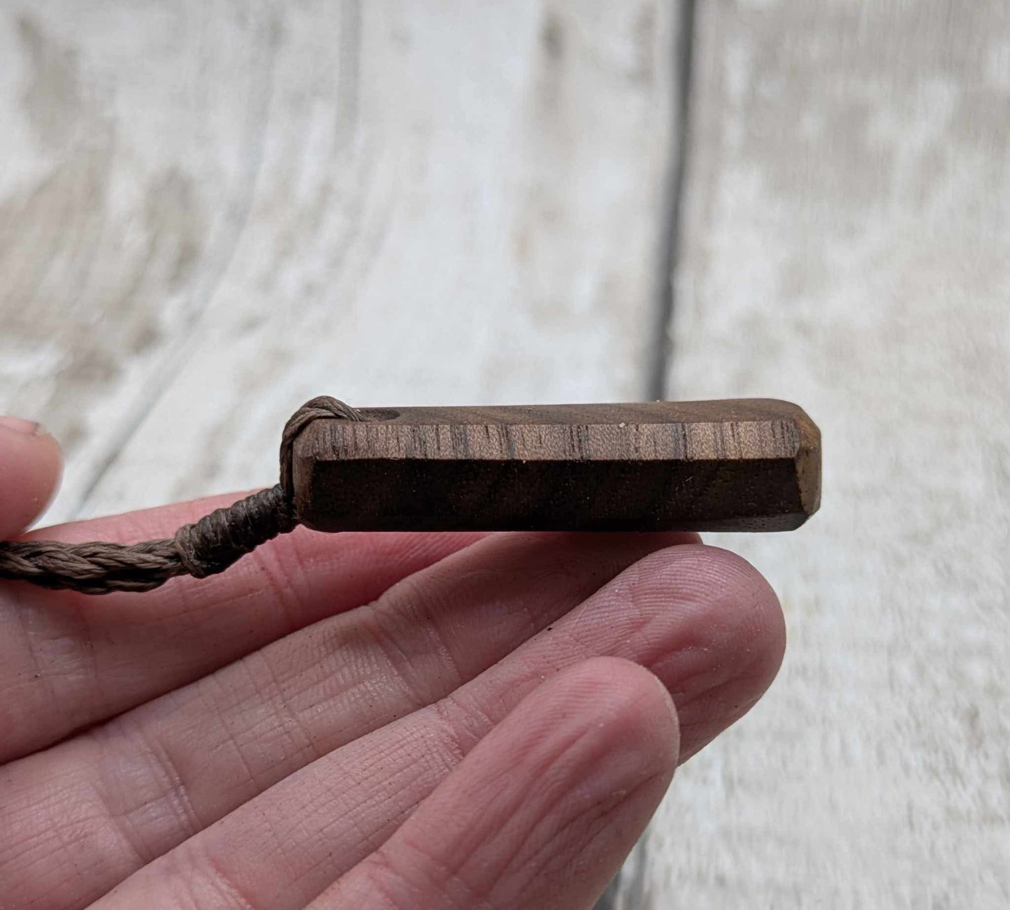 Walnut wood roimata tear drop pendant.