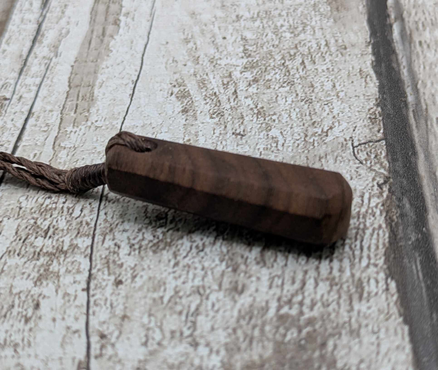 Walnut wood roimata tear drop pendant.