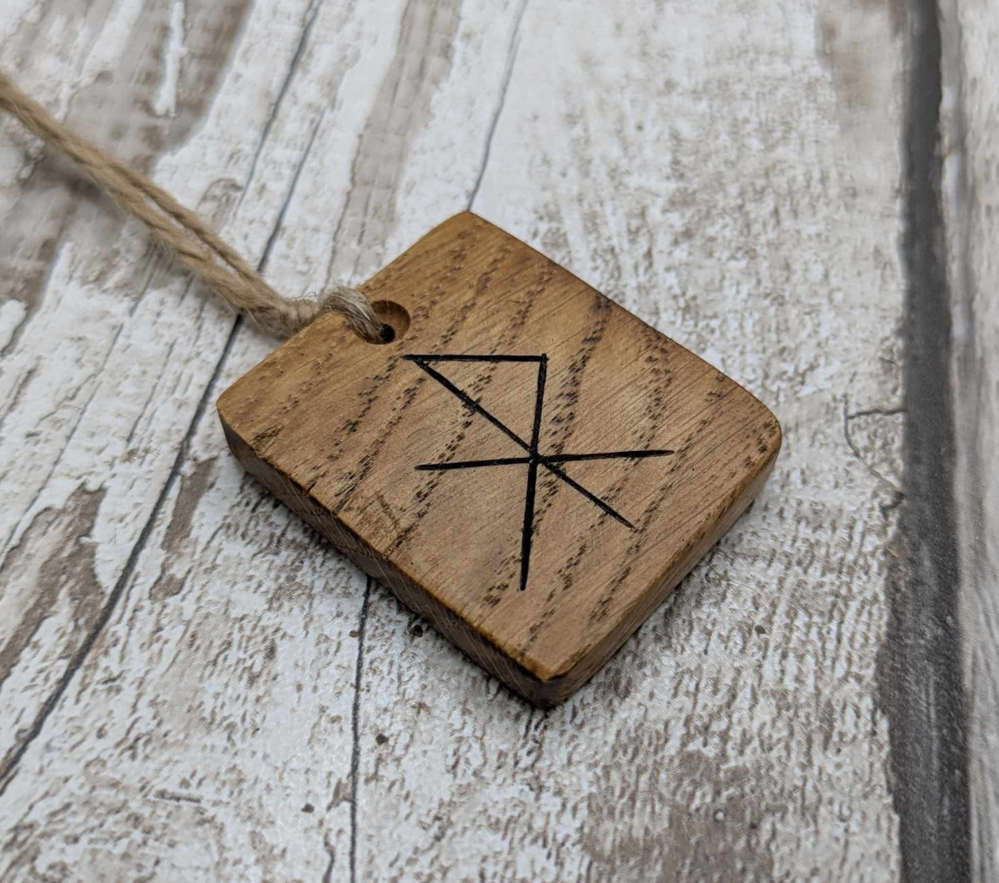 Oak wood courage bind rune hanging decoration.
