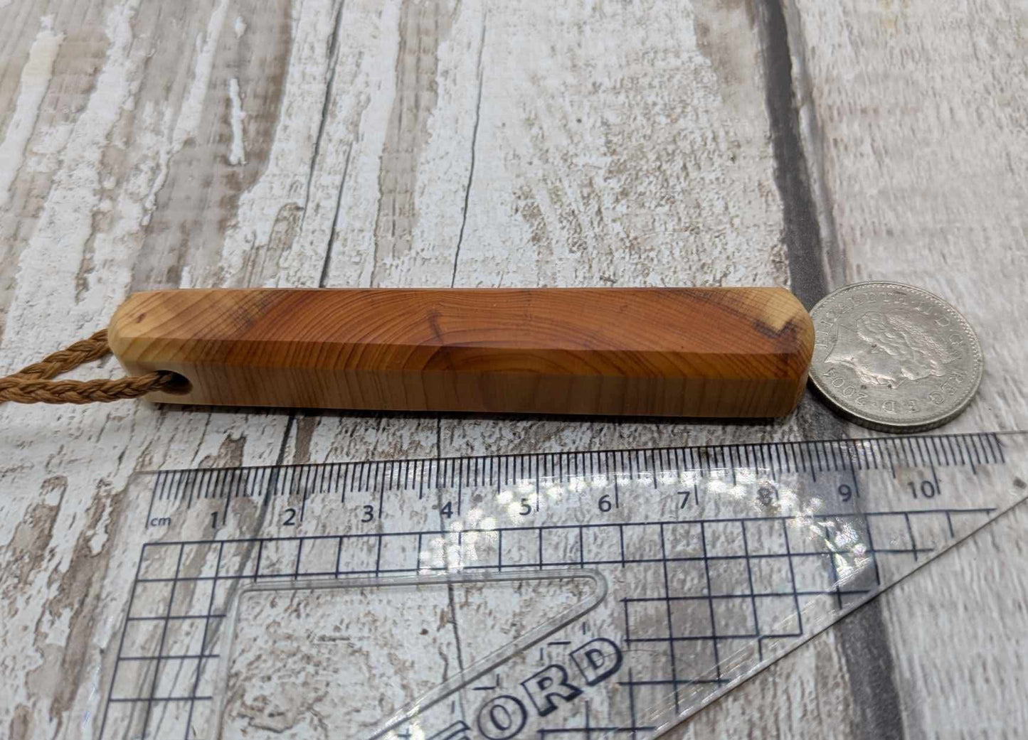 Yew wood roimata pendant.