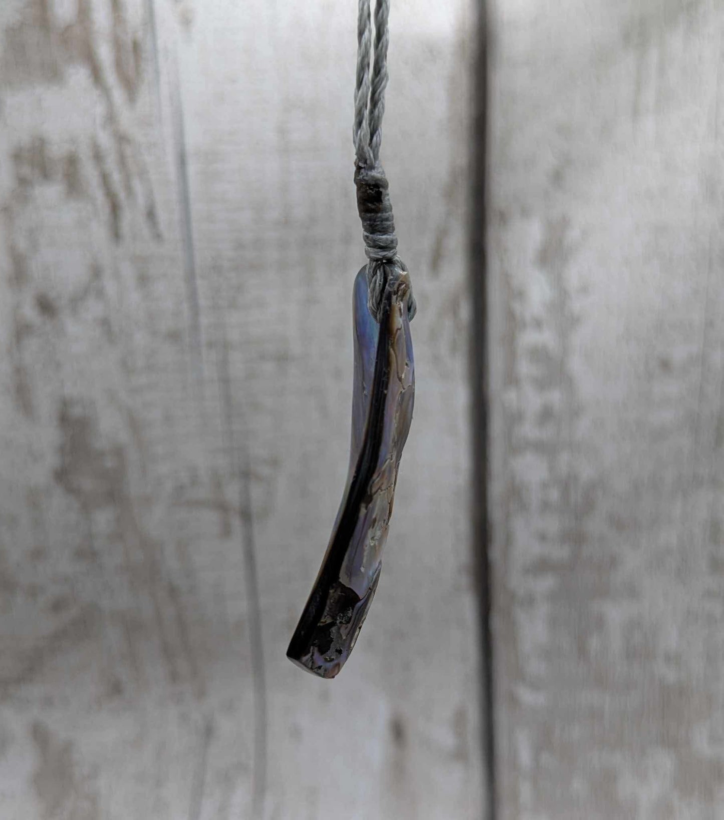 New Zealand pāua shell pendant.