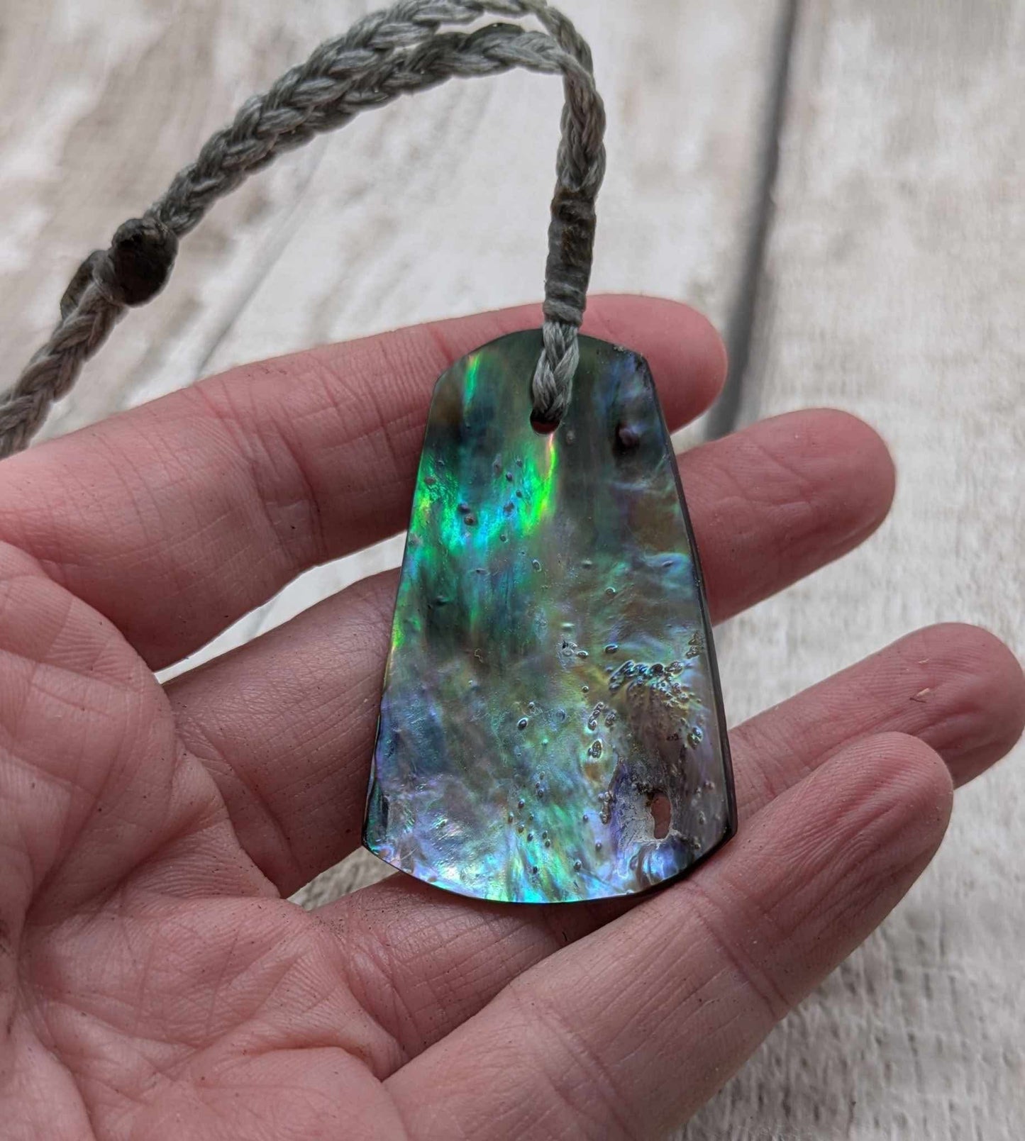 New Zealand pāua shell pendant.