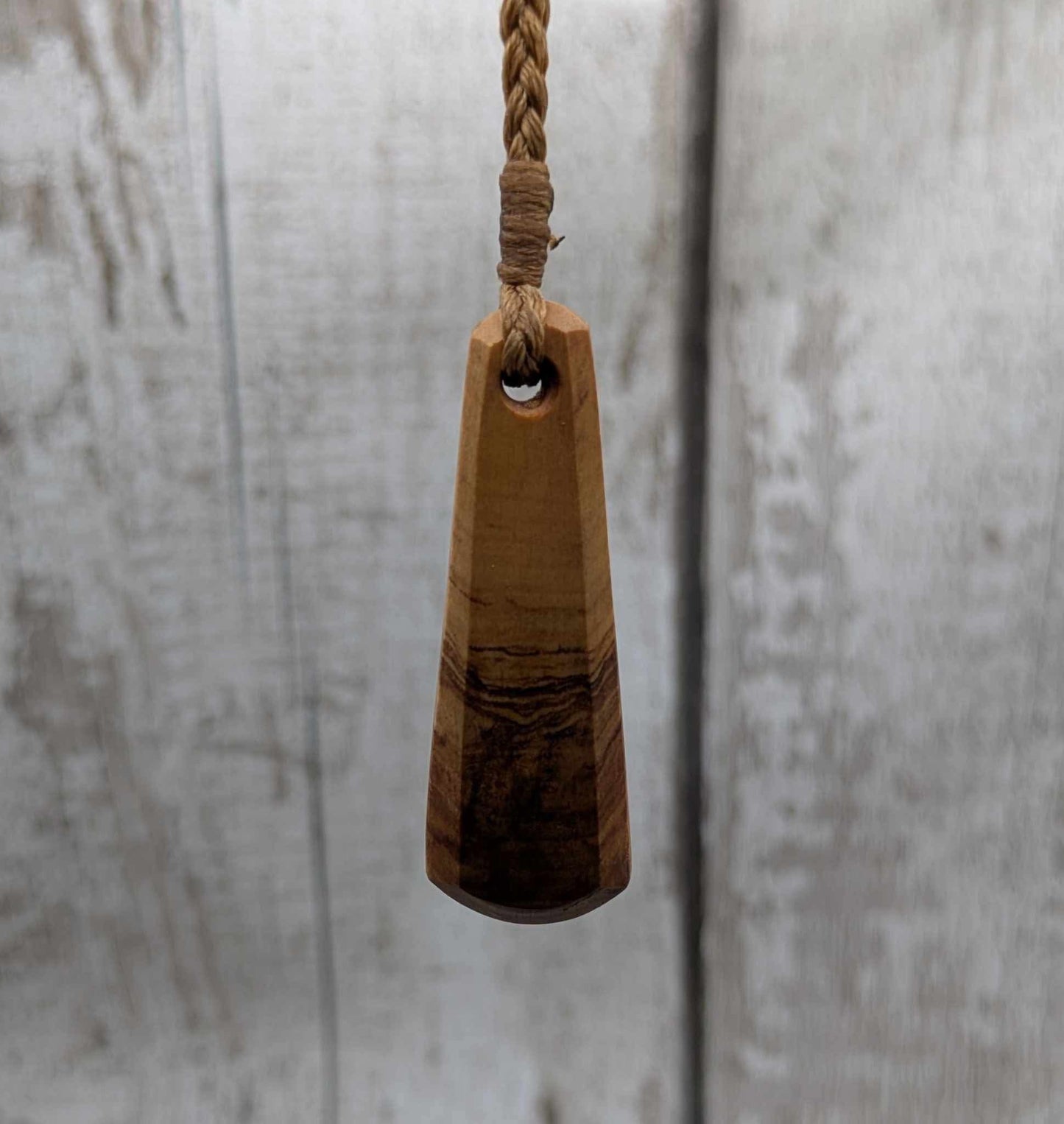 NZ Rimu wood roimata teardrop pendant.