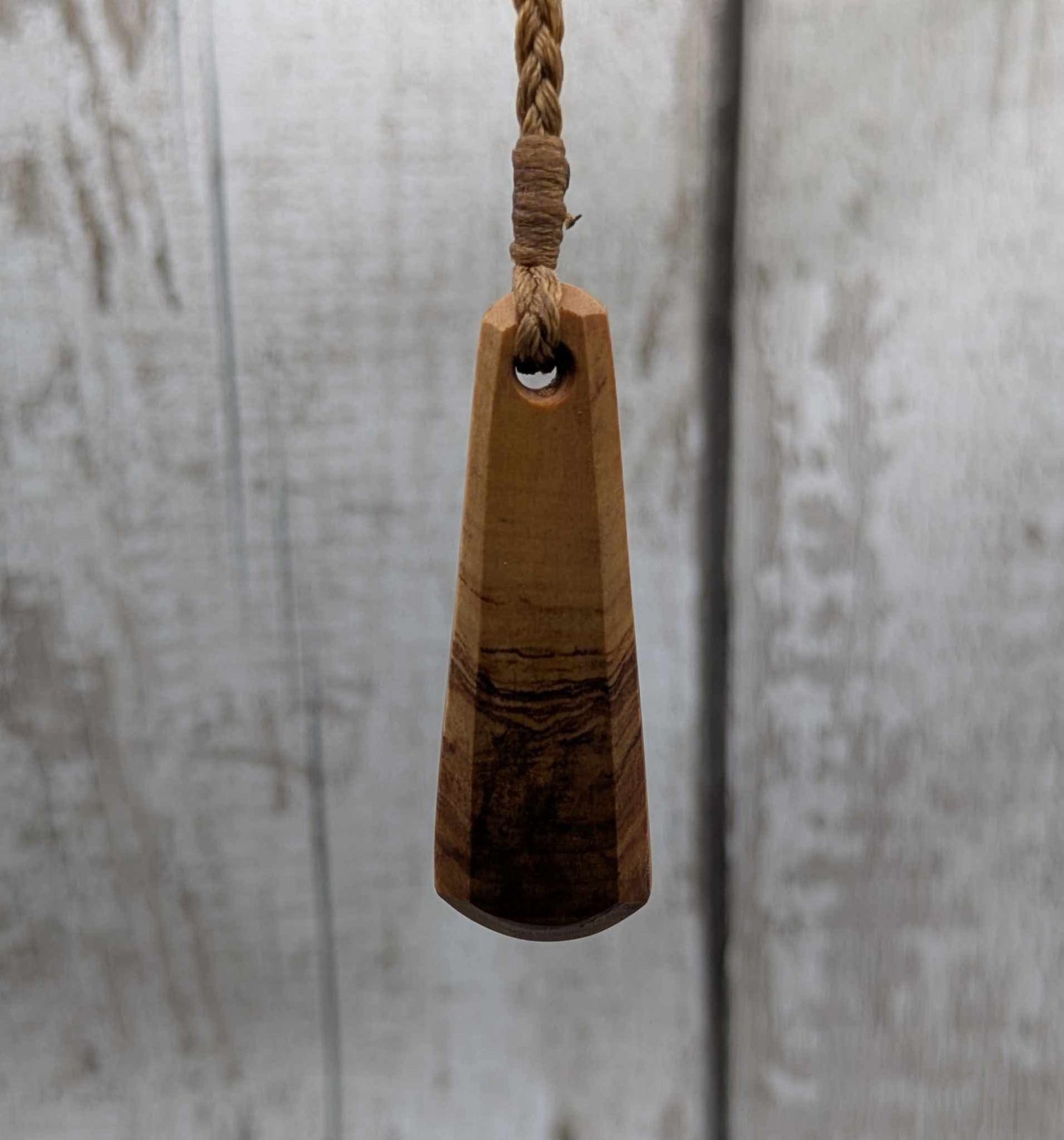 NZ Rimu wood roimata teardrop pendant.