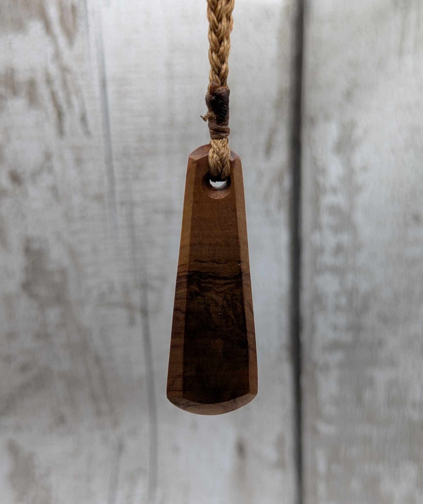 NZ Rimu wood roimata teardrop pendant.