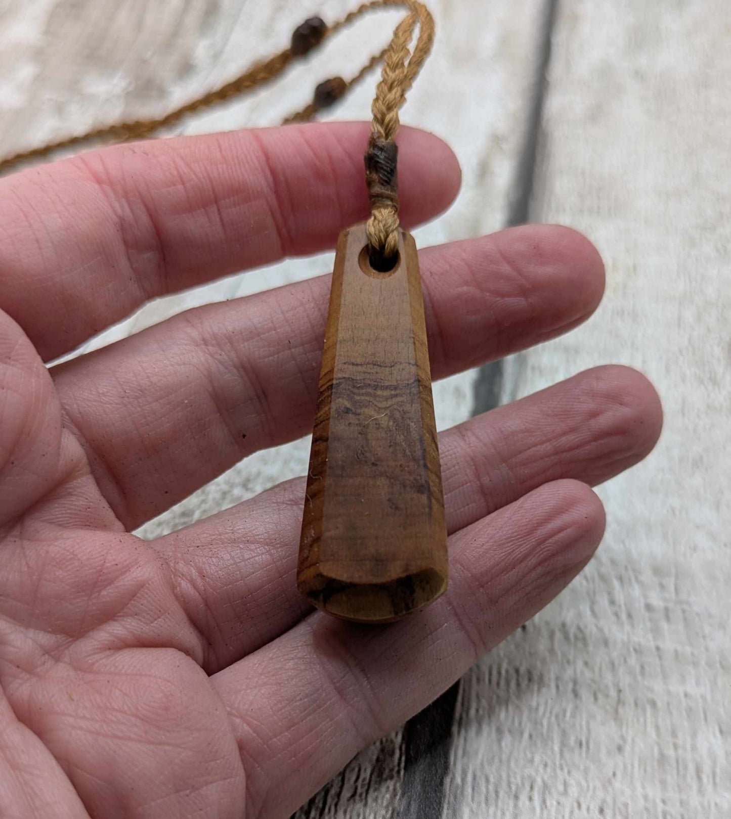 NZ Rimu wood roimata teardrop pendant.