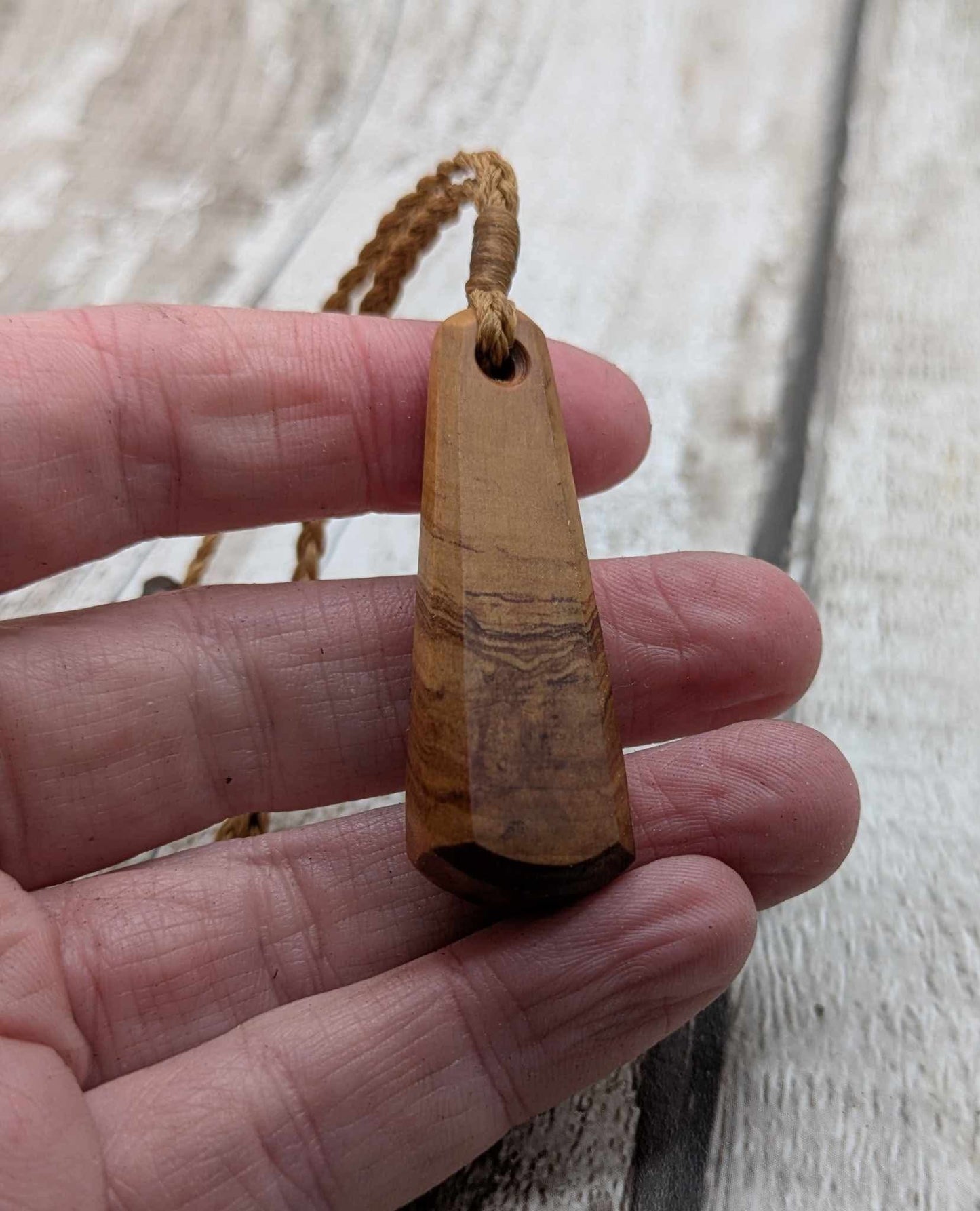NZ Rimu wood roimata teardrop pendant.