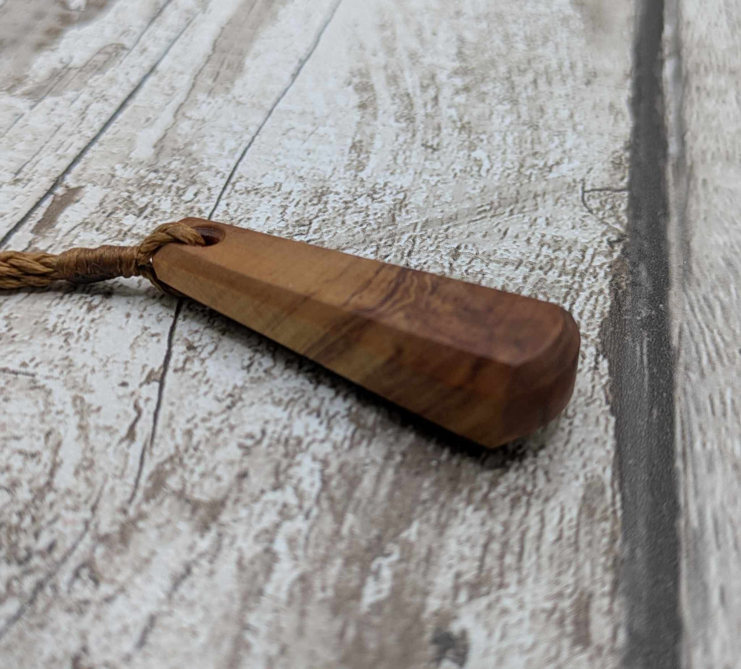 NZ Rimu wood roimata teardrop pendant.