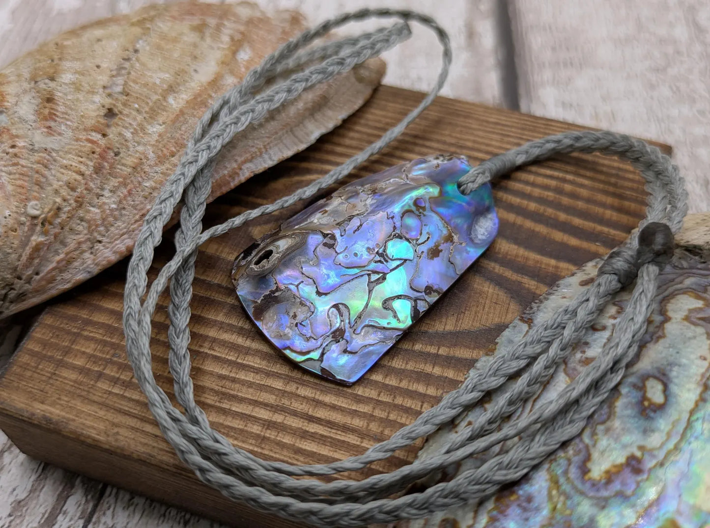 New Zealand pāua shell pendant.