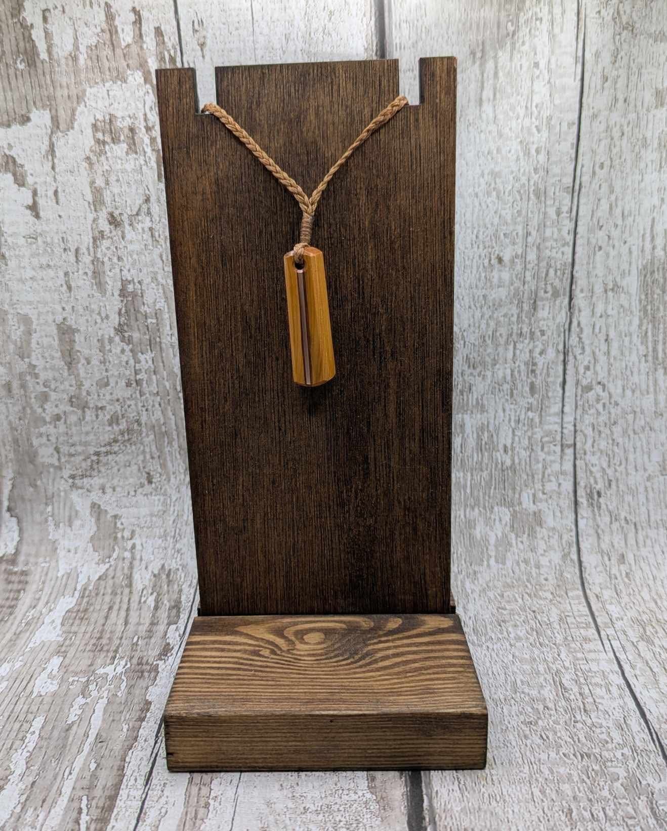 Yew wood roimata drop pendant with copper inlay.