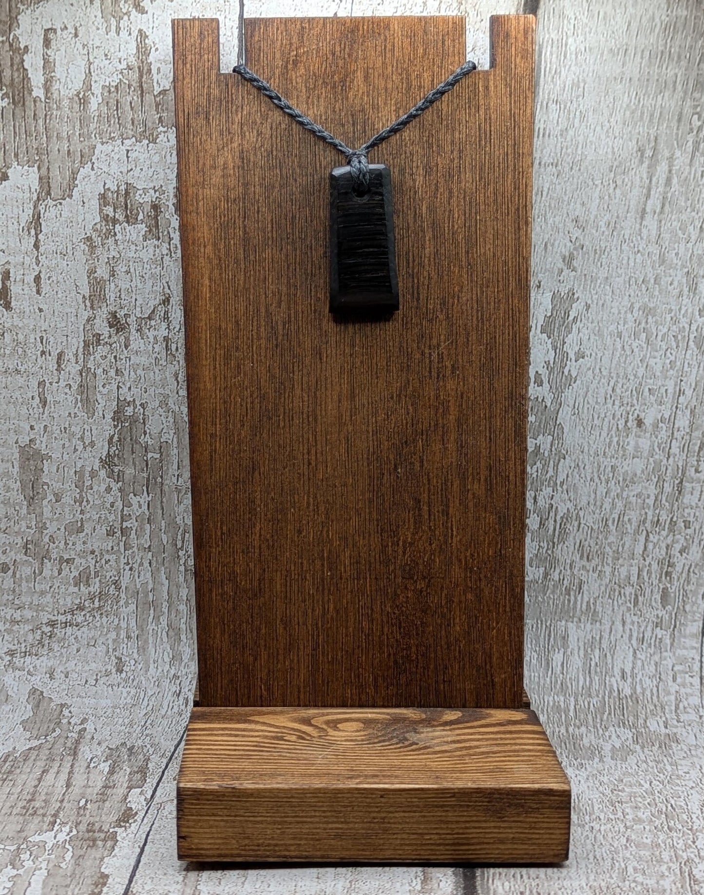 Fenland bog oak hei toki adze styled pendant.
