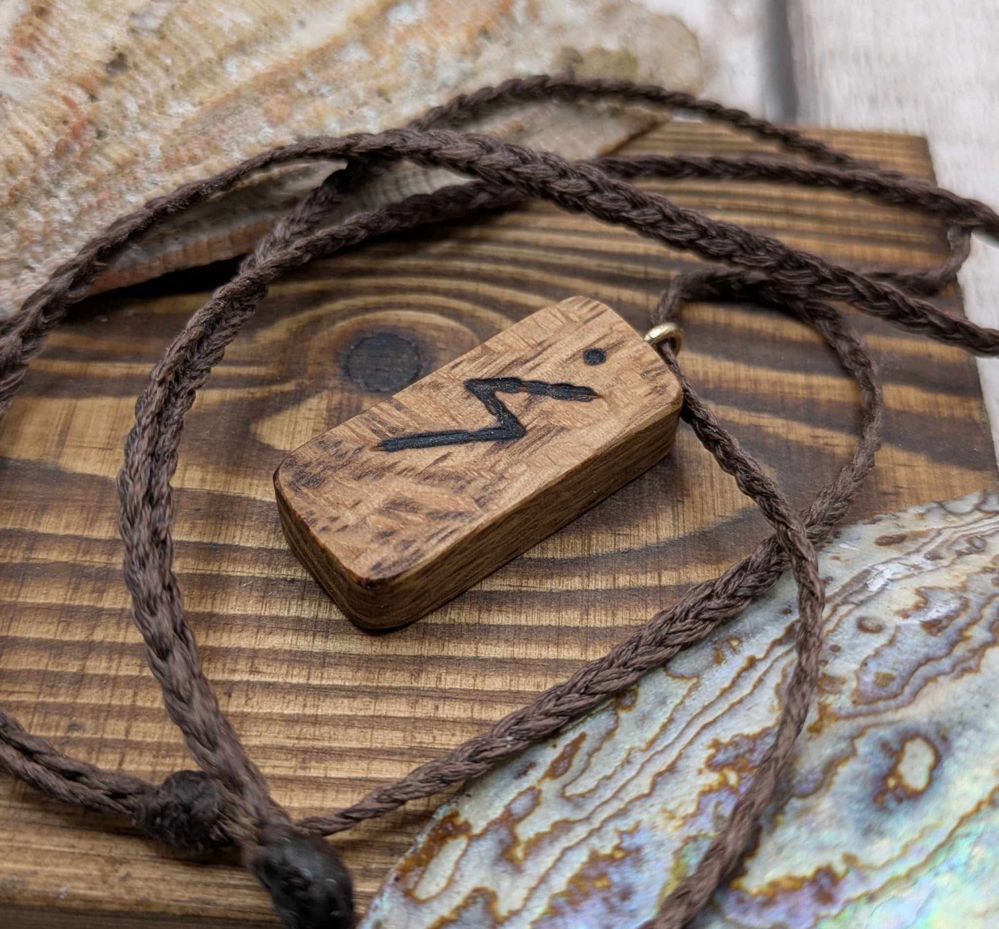 Olive wood sowulo rune pendant.