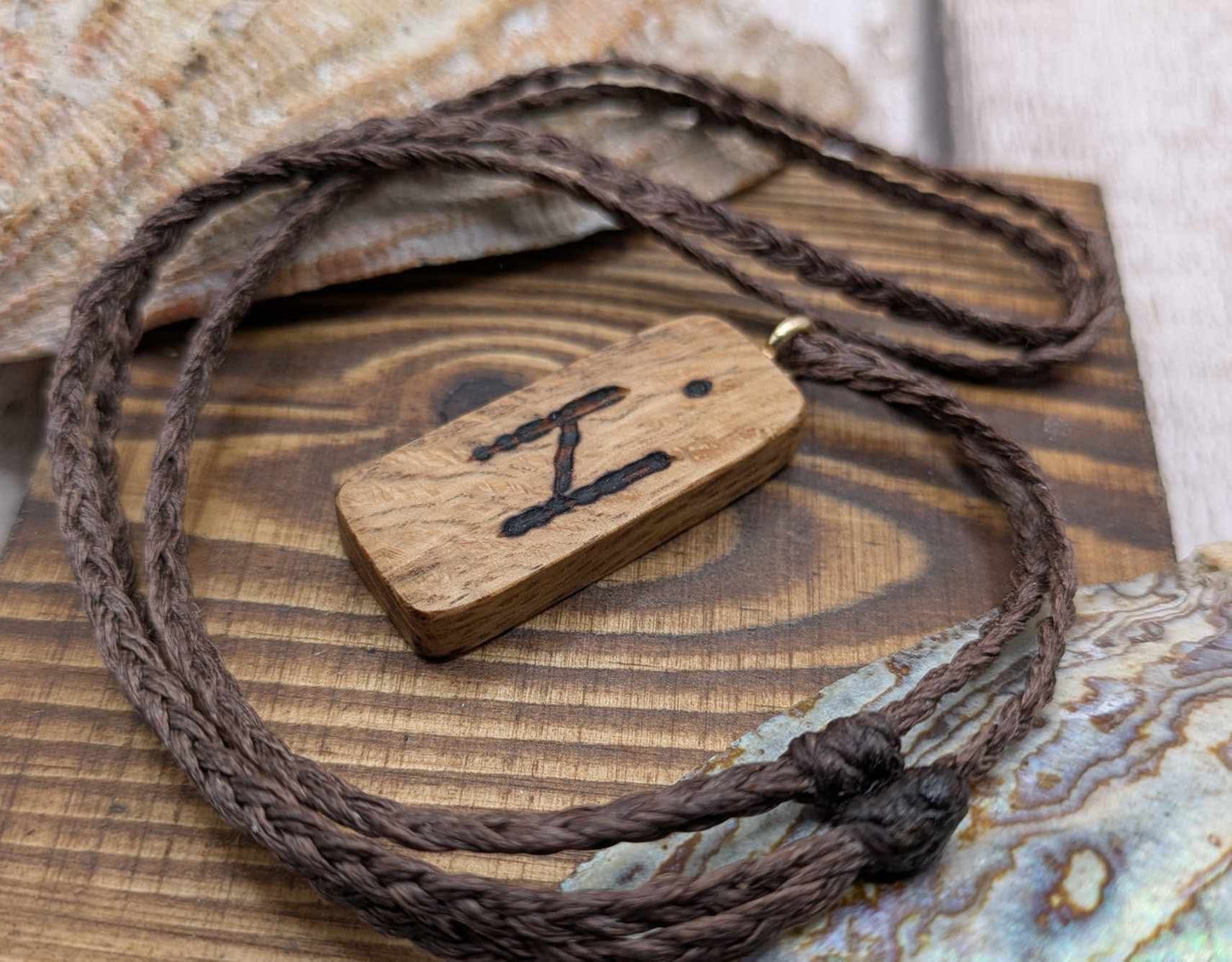 Olive wood hagalaz rune pendant.