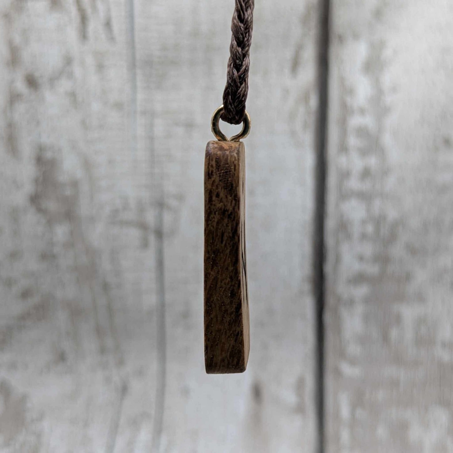 Olive wood hagalaz rune pendant.
