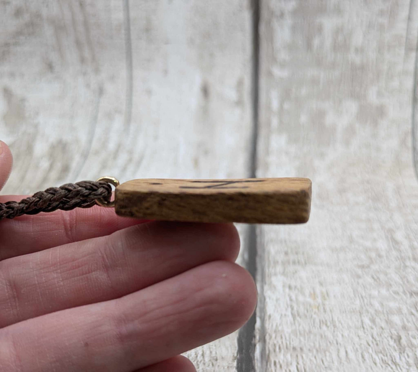 Olive wood hagalaz rune pendant.