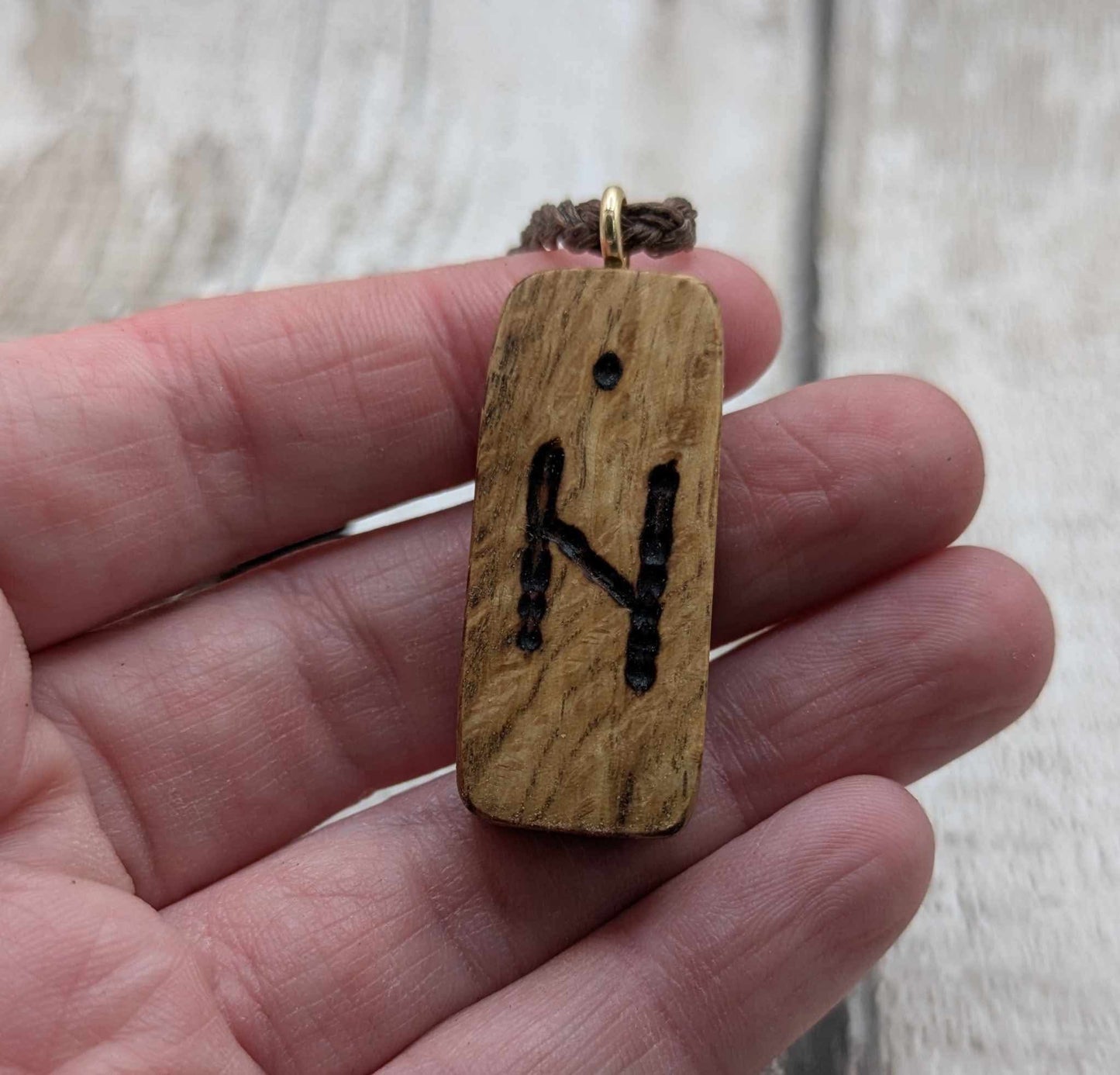 Olive wood hagalaz rune pendant.