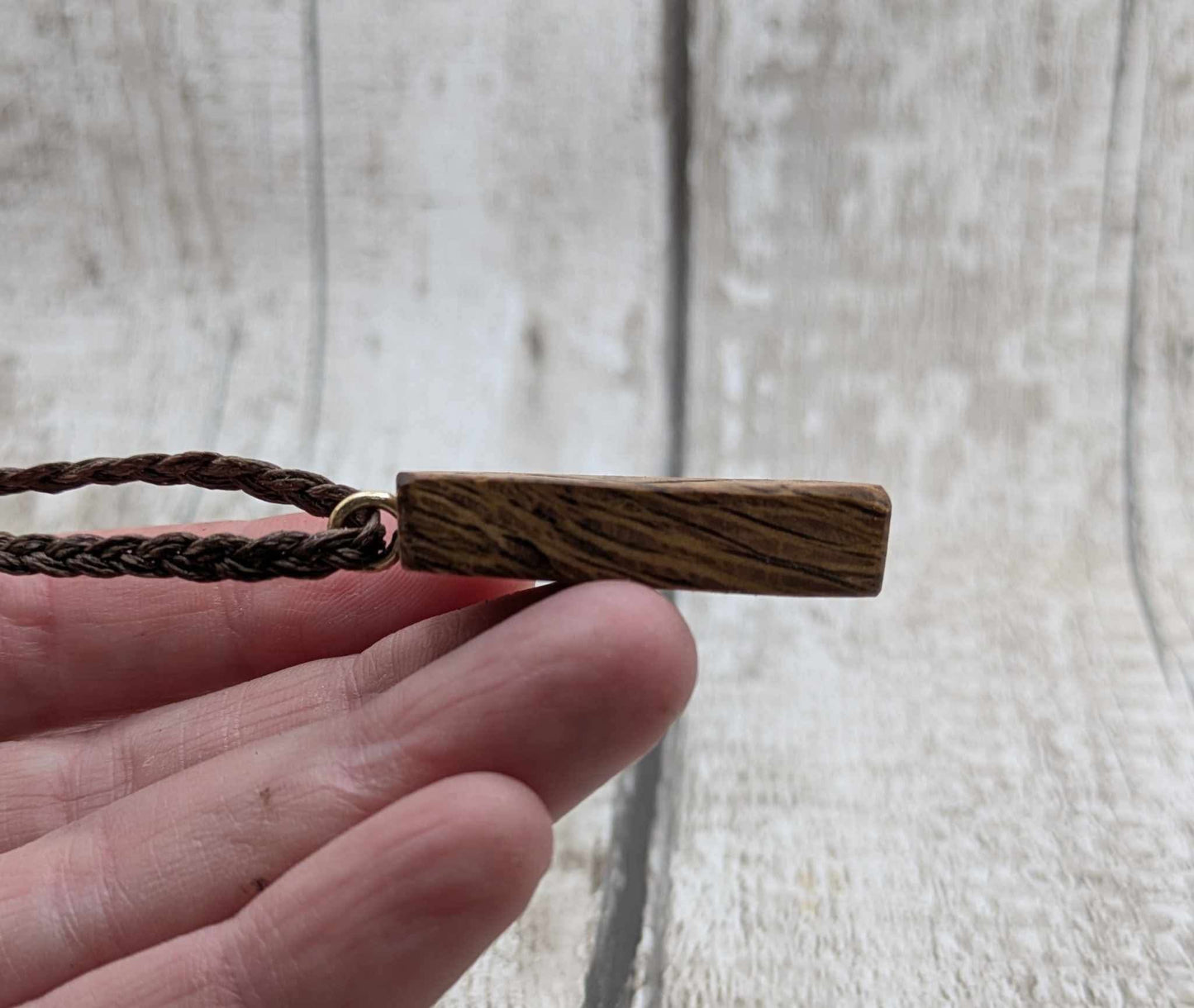 Olive wood kenaz rune pendant.