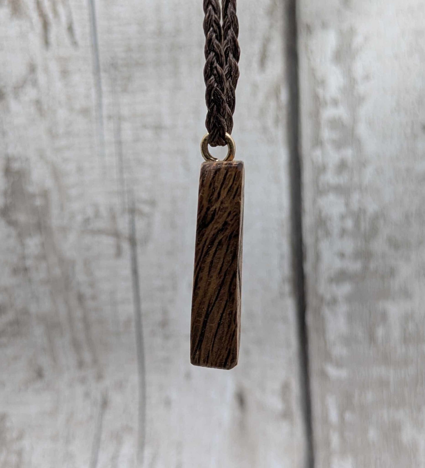Olive wood kenaz rune pendant.