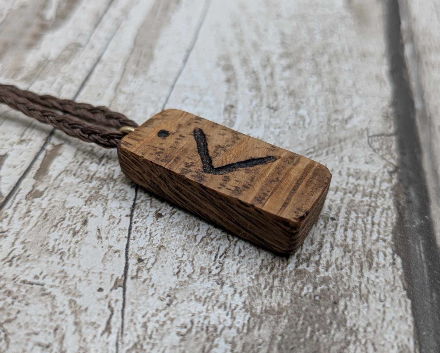 Olive wood kenaz rune pendant.