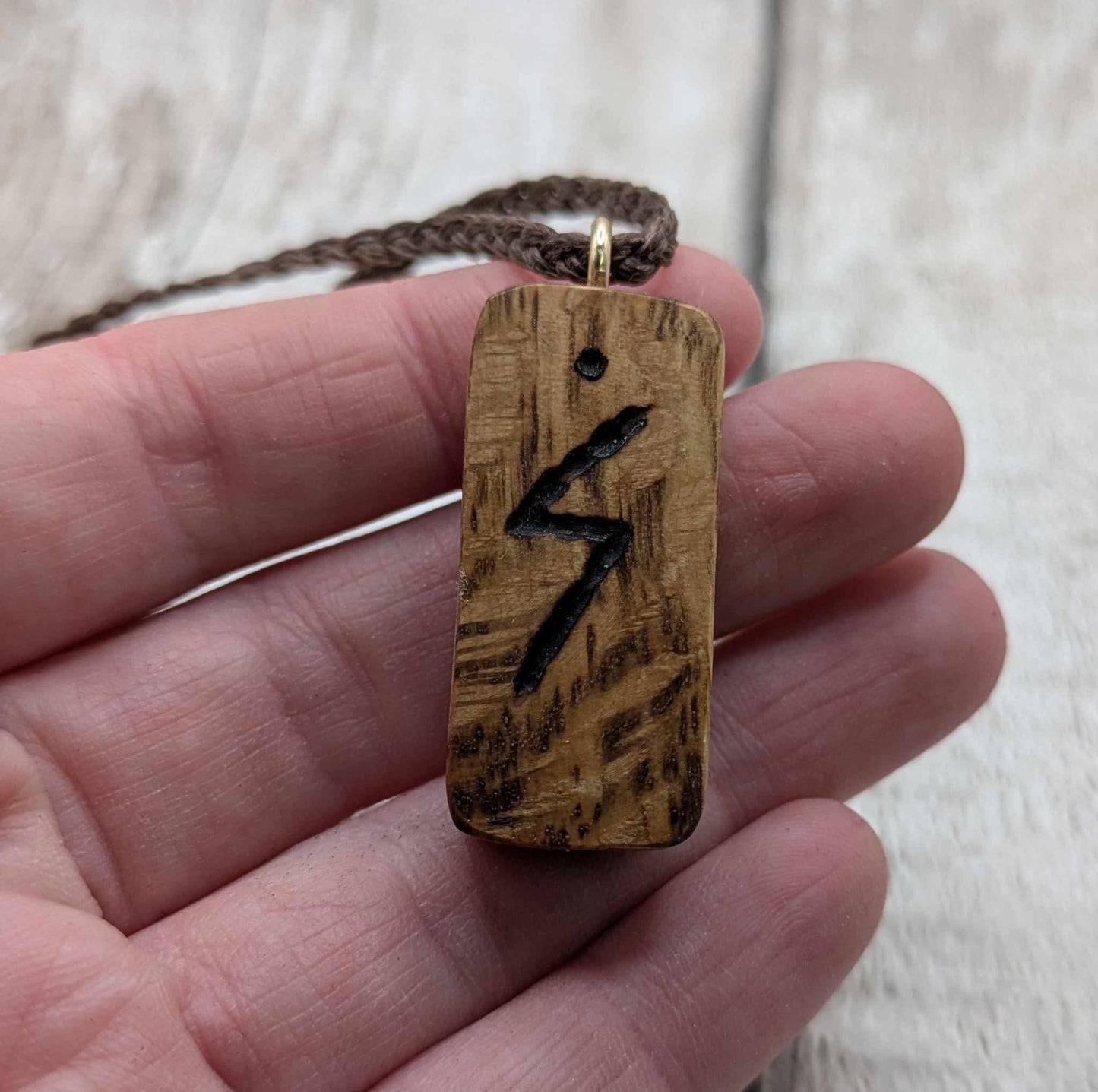 Olive wood sowulo rune pendant.