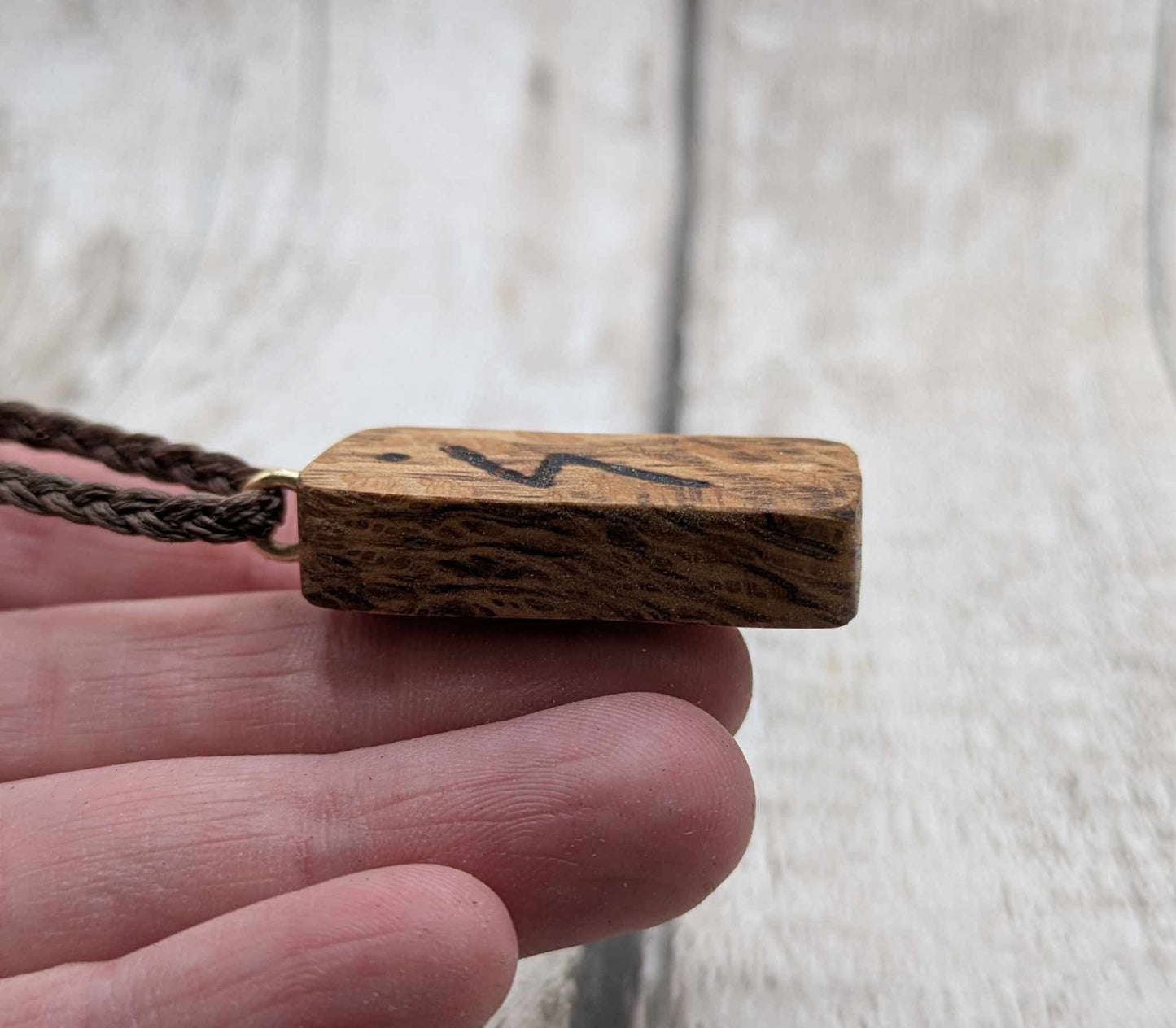 Olive wood sowulo rune pendant.
