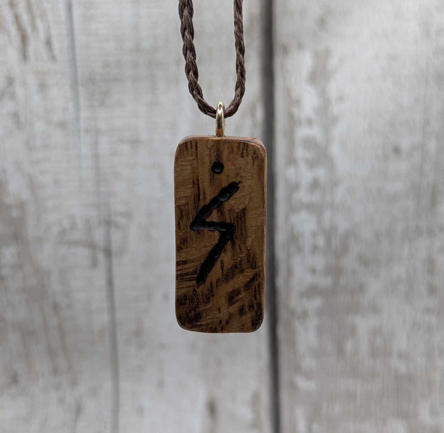 Olive wood sowulo rune pendant.