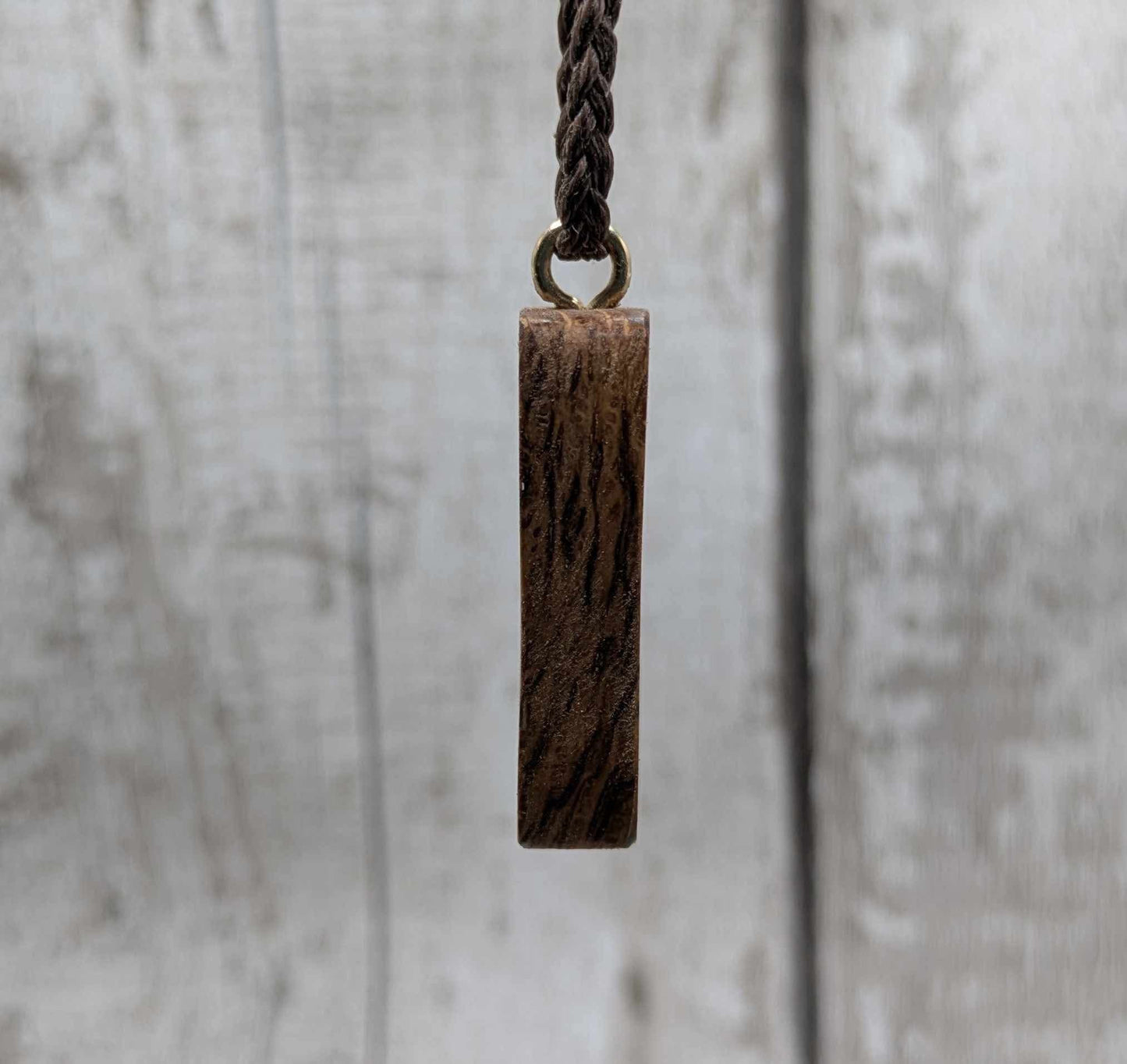 Olive wood sowulo rune pendant.