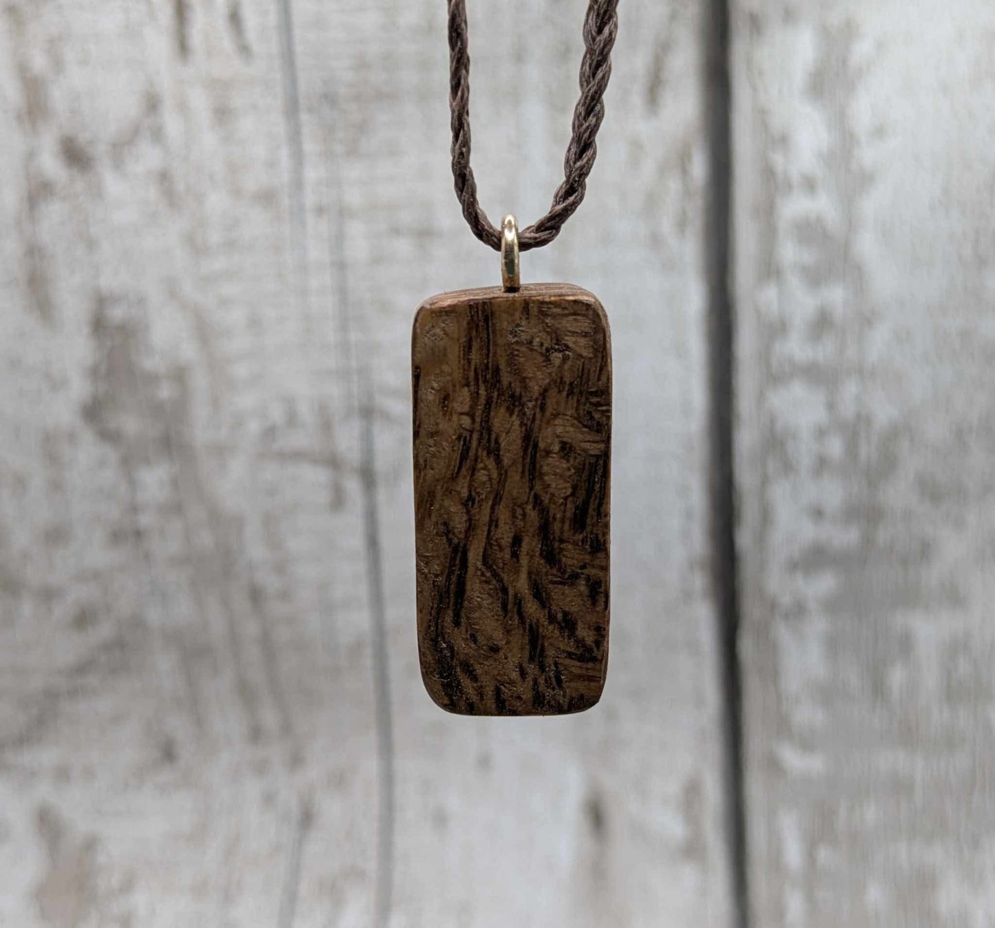 Olive wood sowulo rune pendant.