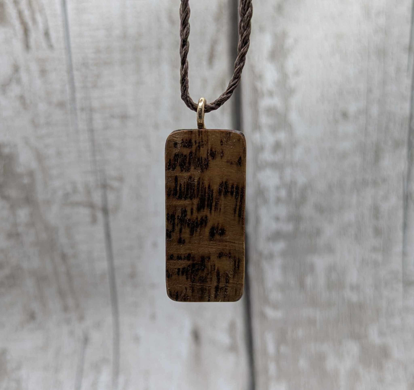 Olive wood fehu rune pendant,