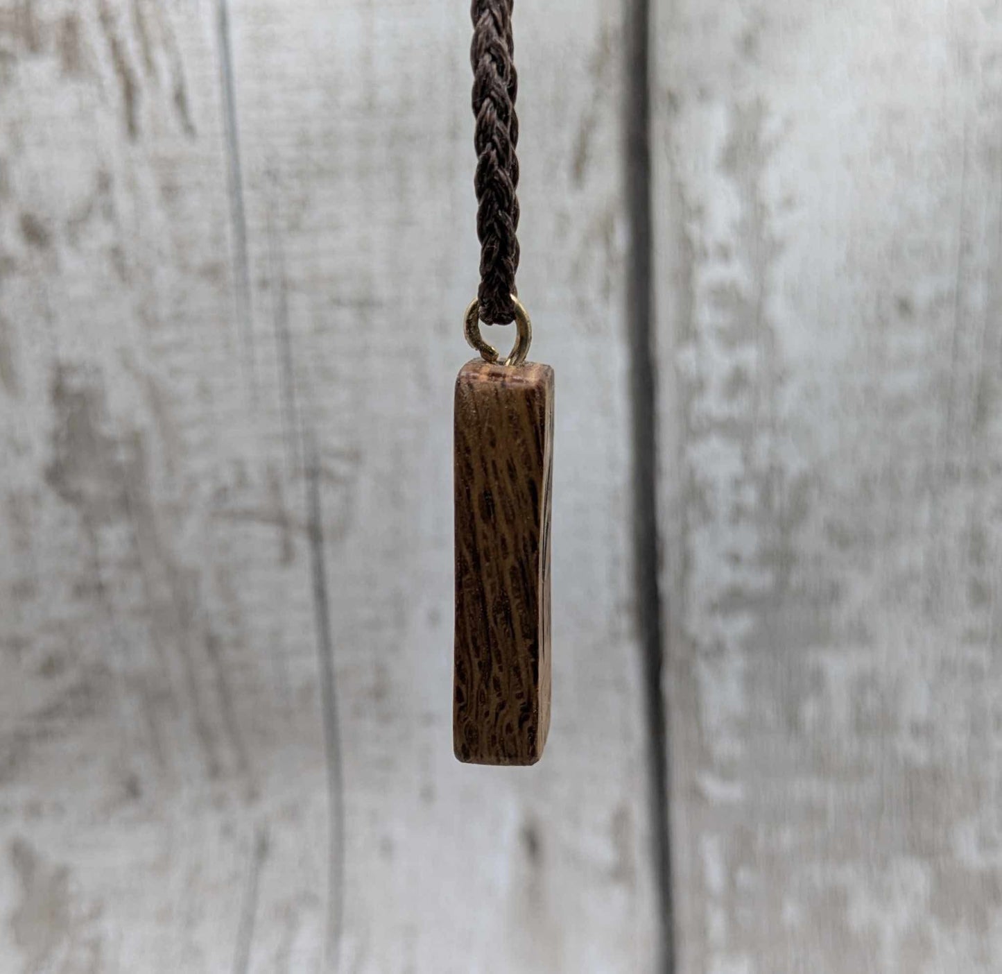 Olive wood fehu rune pendant,