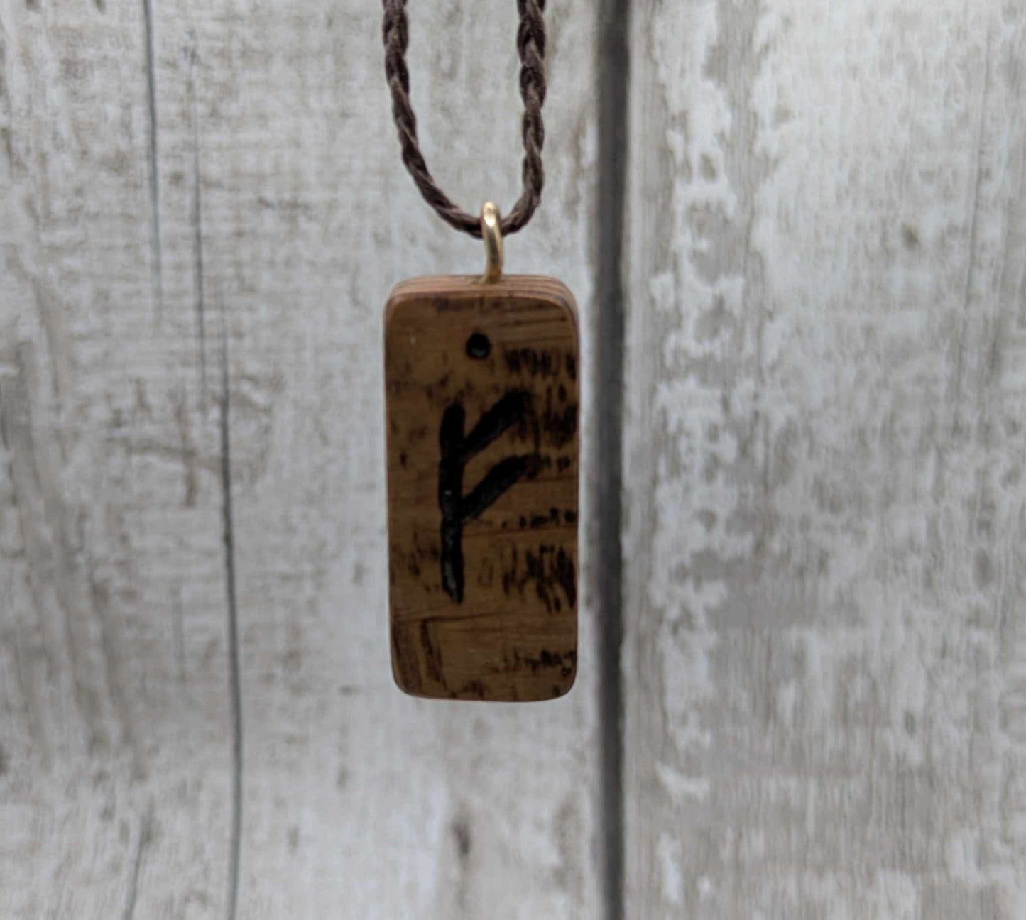 Olive wood fehu rune pendant,