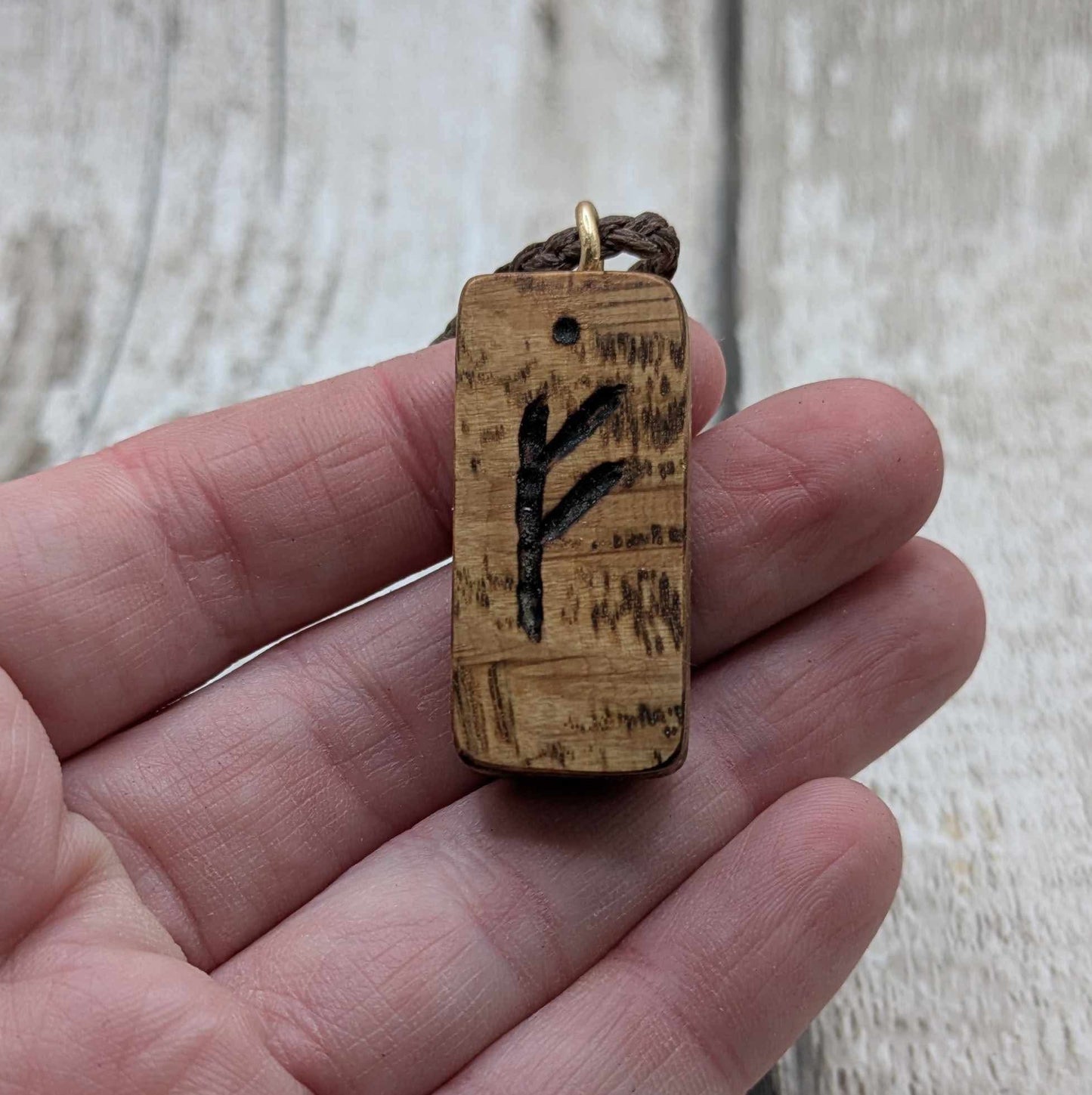 Olive wood fehu rune pendant,