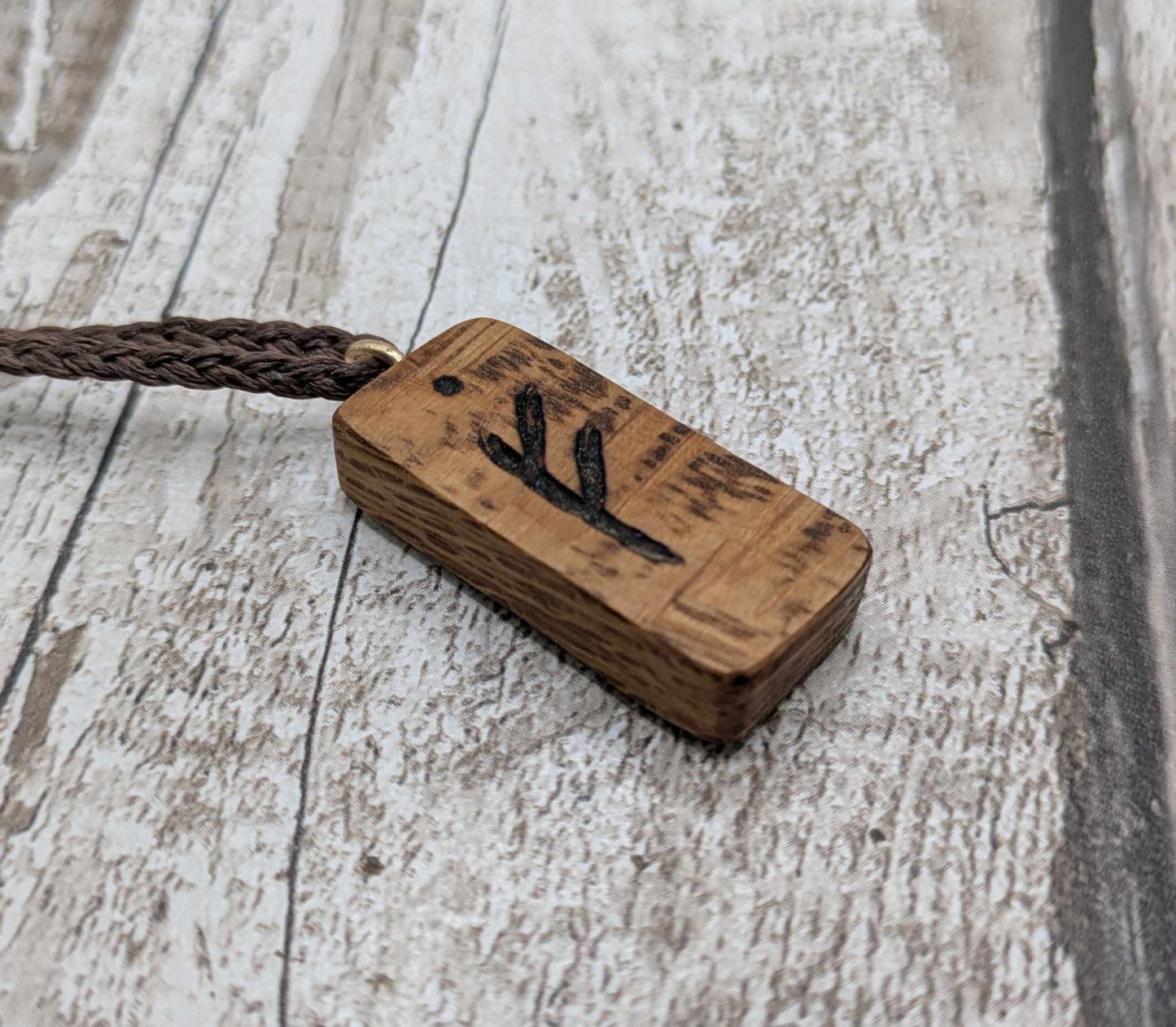 Olive wood fehu rune pendant,