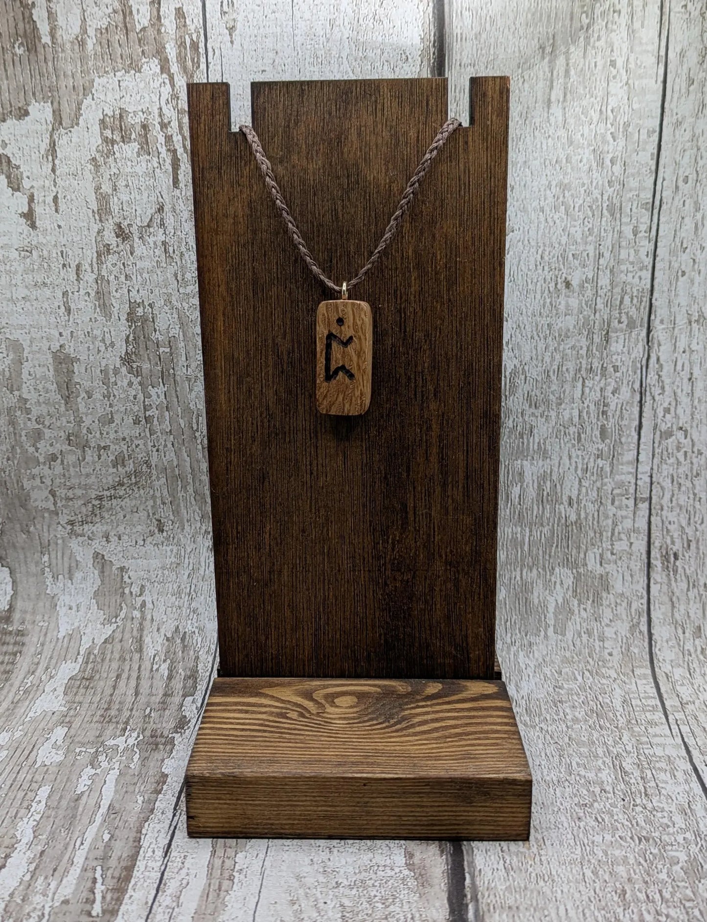 Olive wood purthro rune pendant.