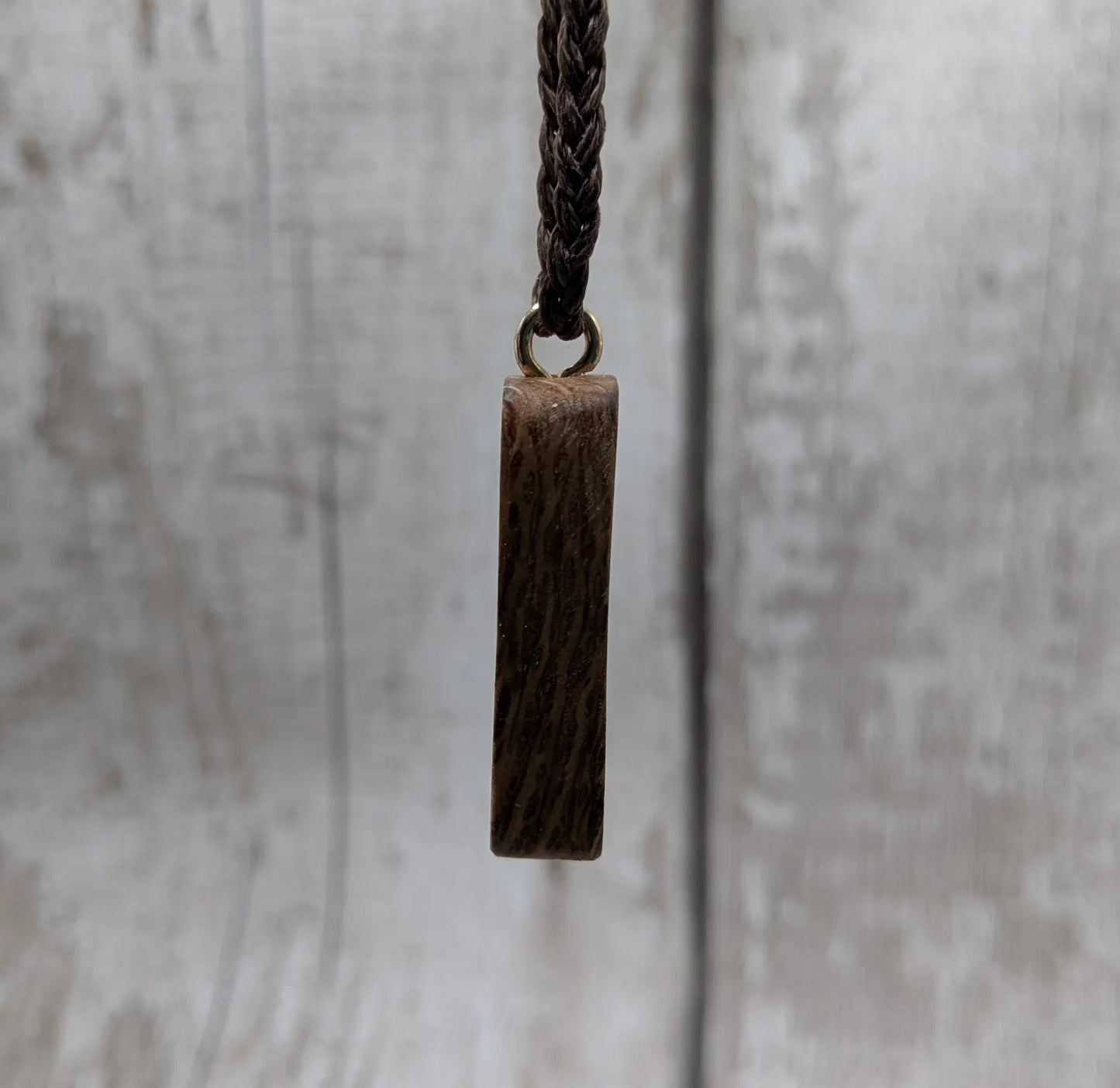 Olive wood purthro rune pendant.
