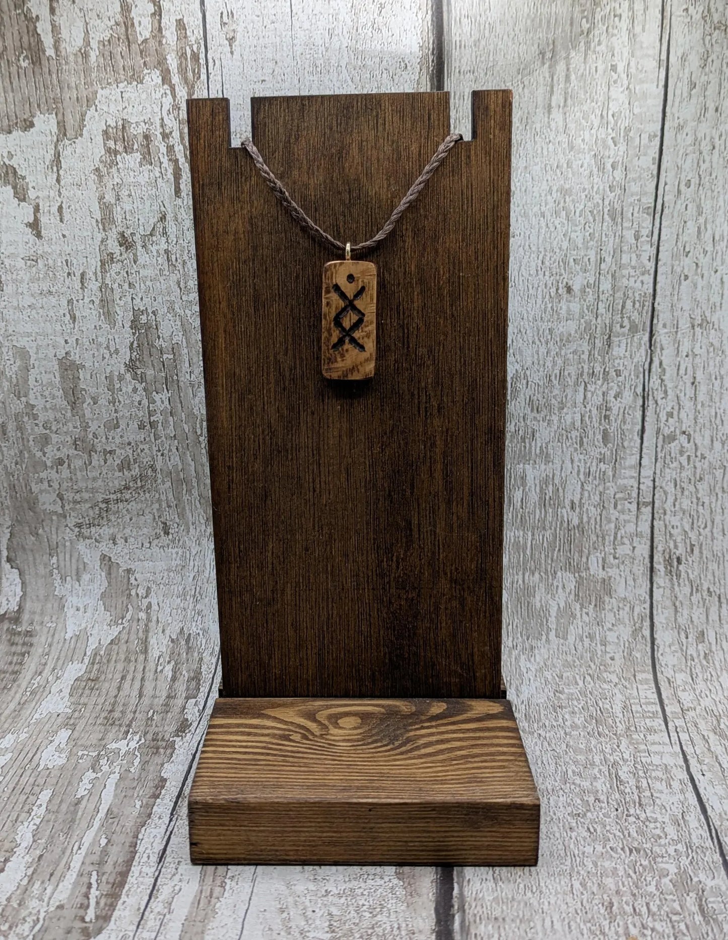 Olive wood ingwaz rune pendant.