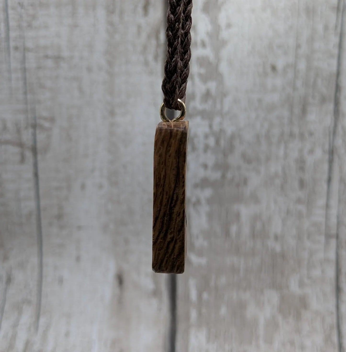 Olive wood ingwaz rune pendant.
