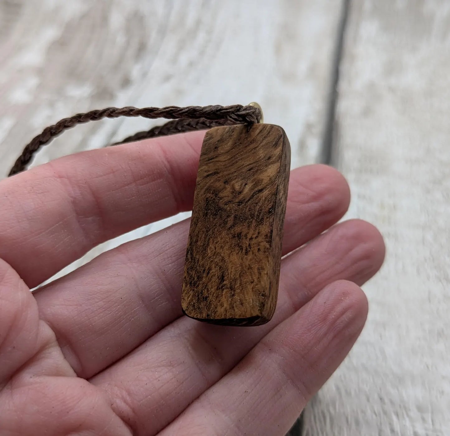Olive wood ansuz rune pendant.