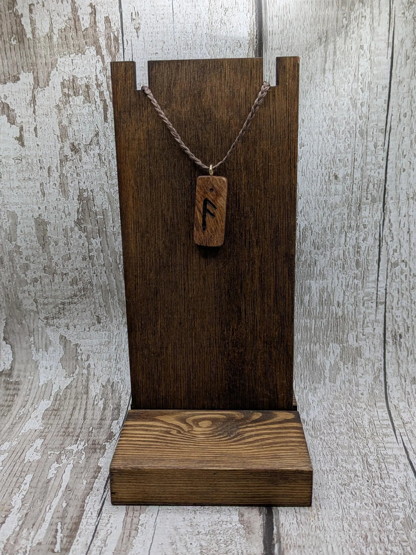 Olive wood ansuz rune pendant.