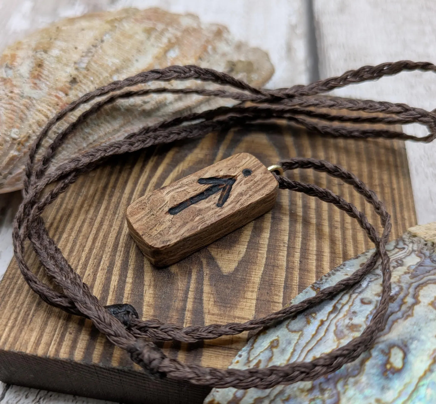 Olive wood tiwaz rune pendant.