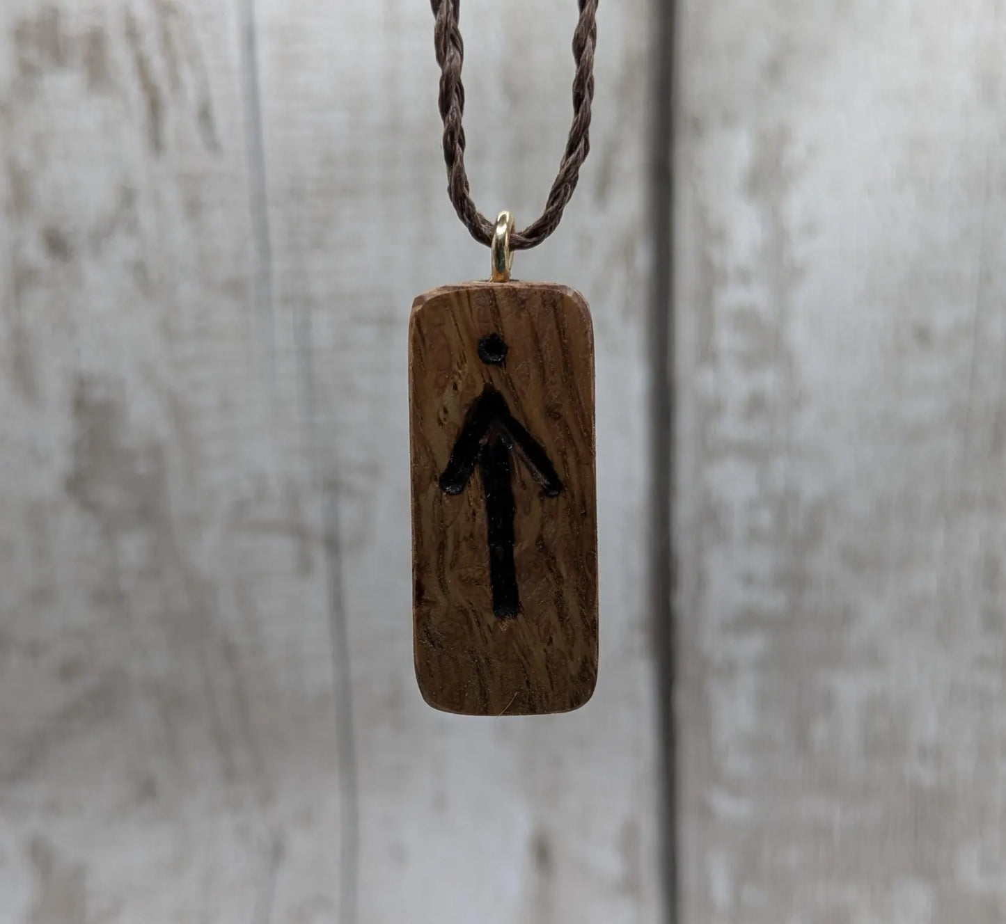 Olive wood tiwaz rune pendant.