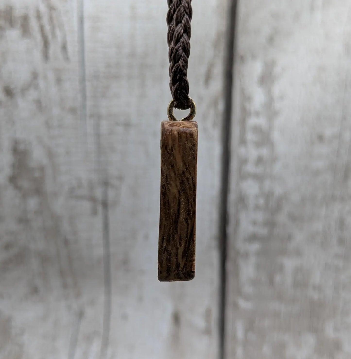 Olive wood tiwaz rune pendant.
