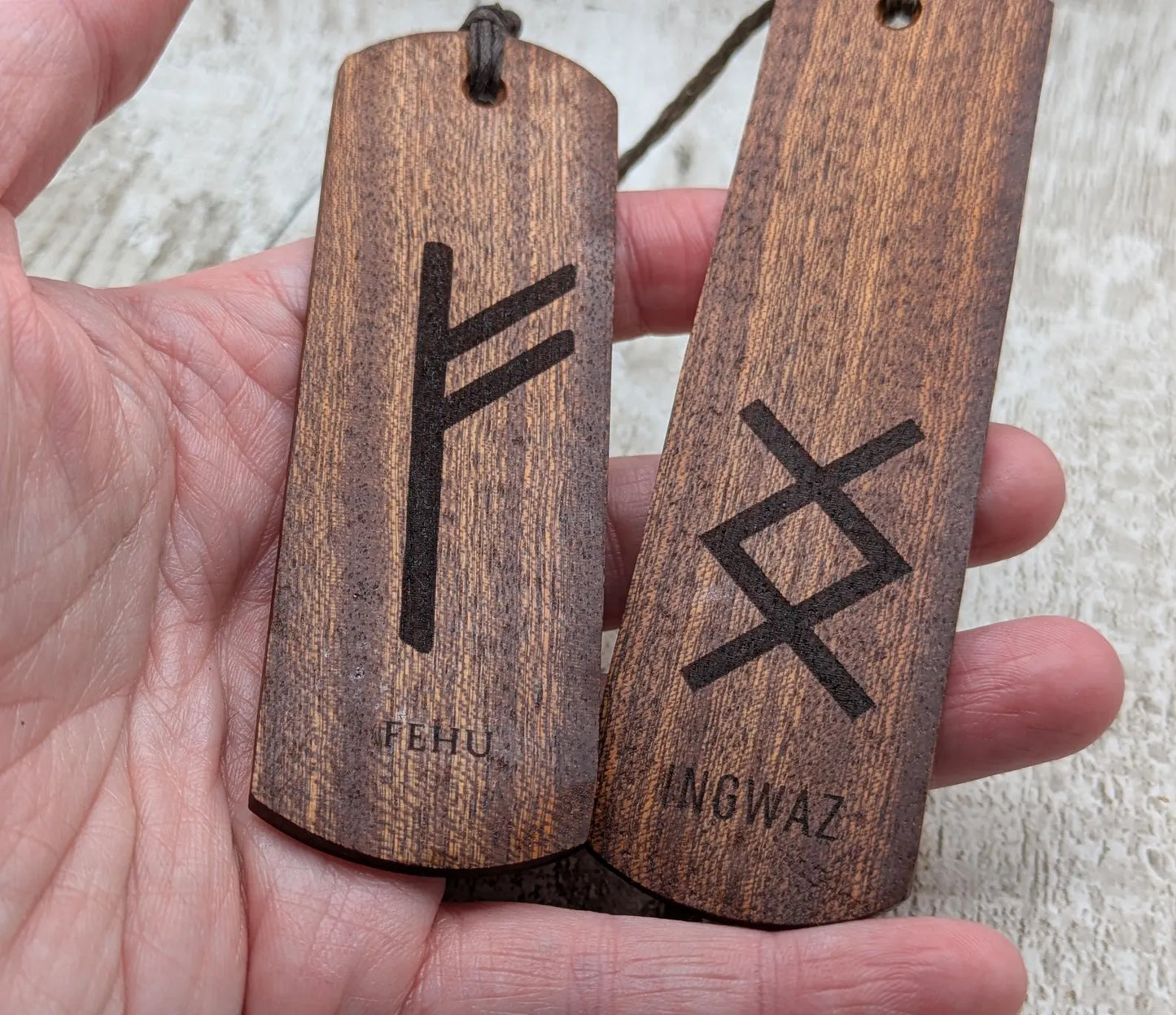 Walnut wood handmade bookmark with fehu Norse rune laser print.